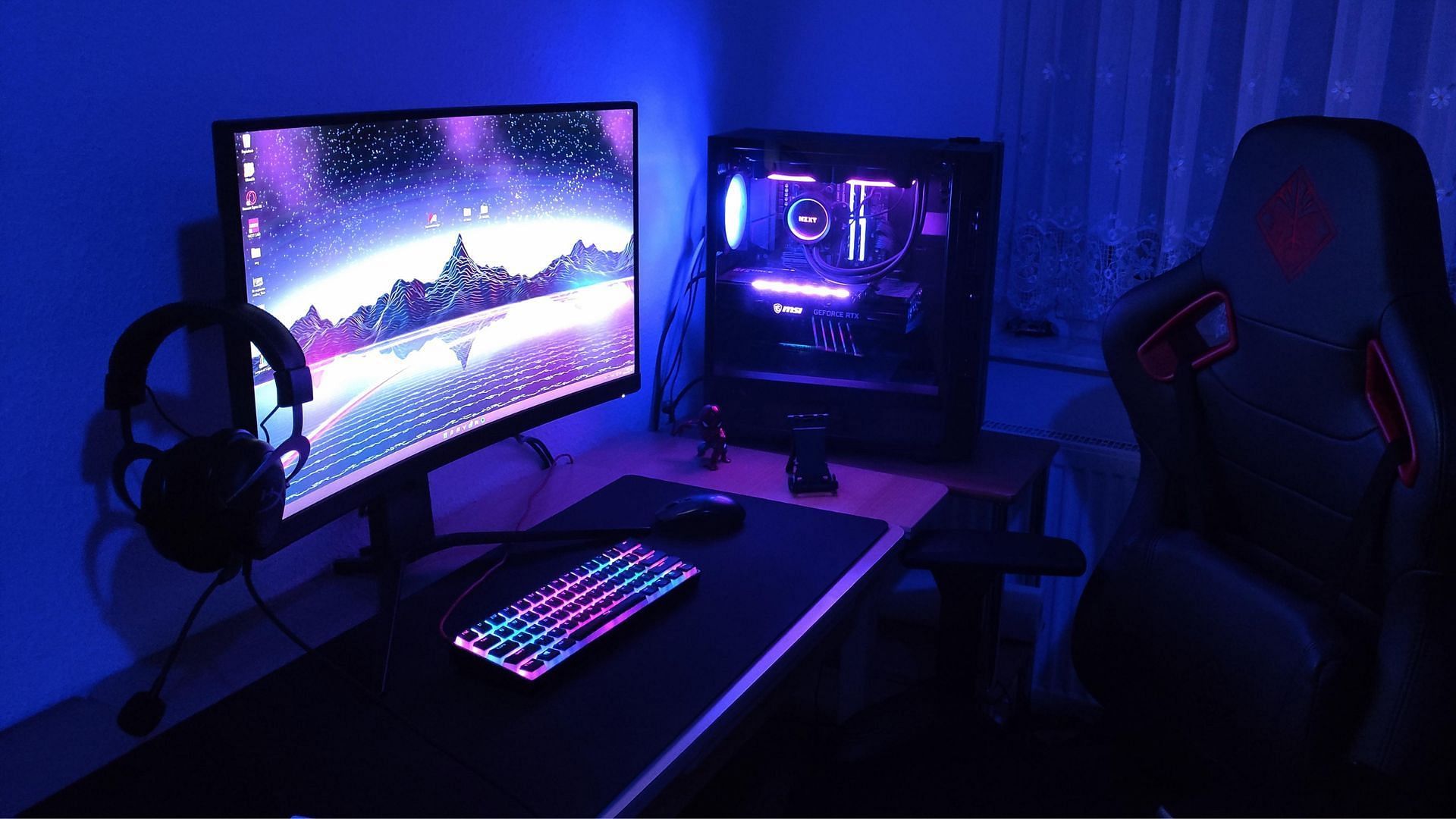 A gaming PC lit up with RGB lights (Image via u/Pihlox/Reddit)