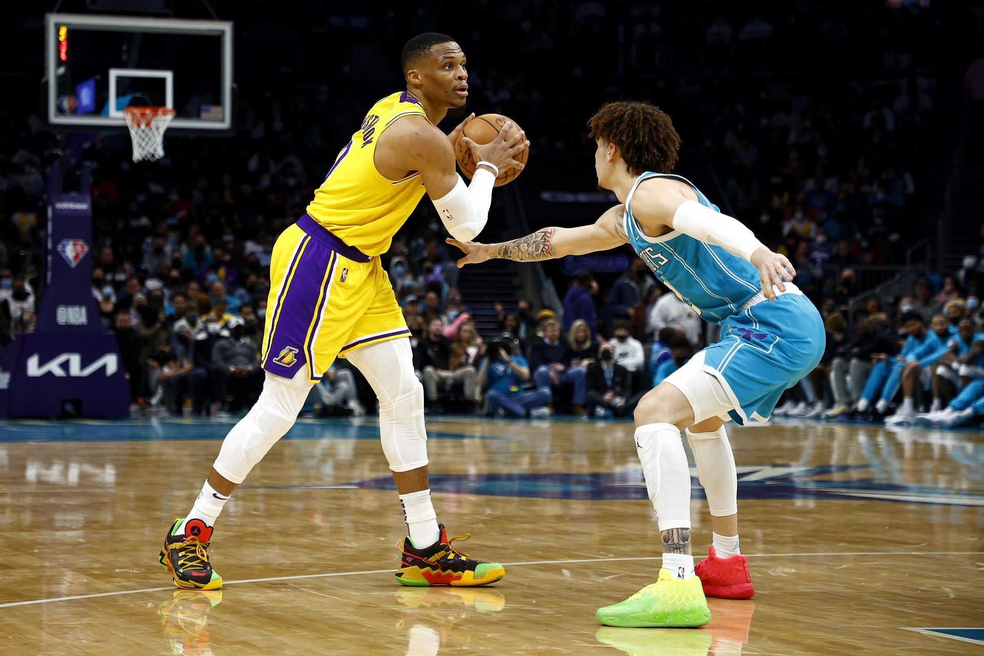 Russell Westbrook, left, and LaMelo Ball, right.