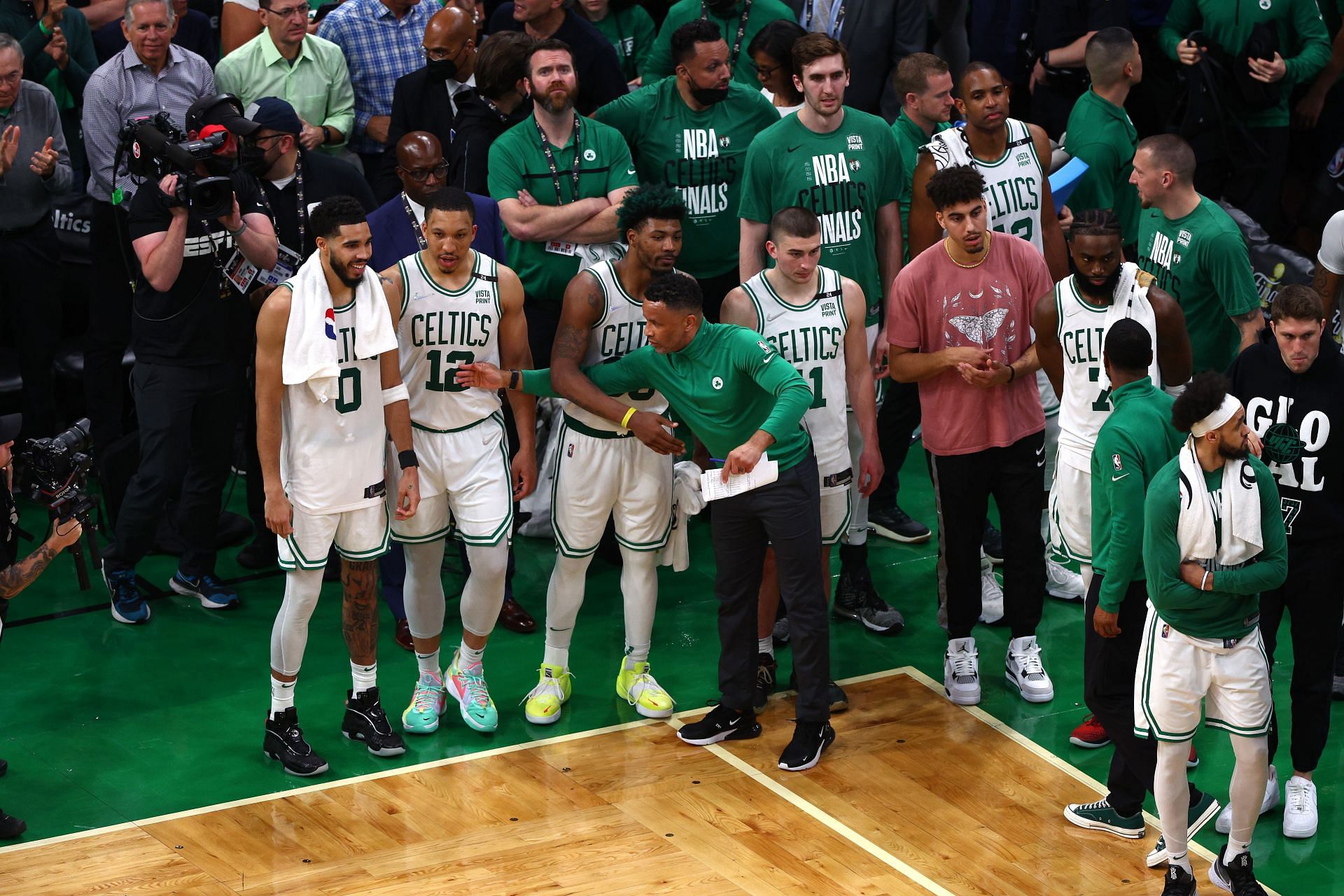 Boston Celtics players watch during the 2022 NBA Finals - Game Three.