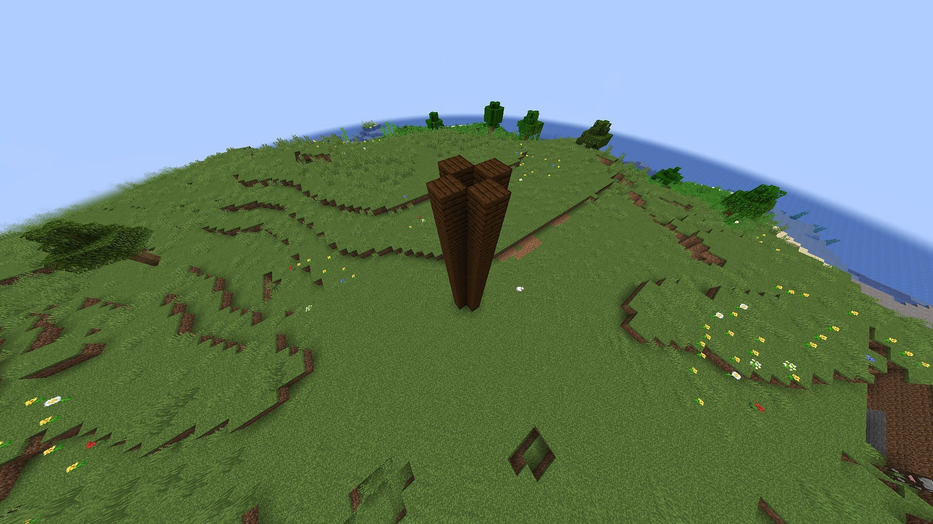 The initial four blocks need to be stacked up to make a tower-like structure (Image via Minecraft)