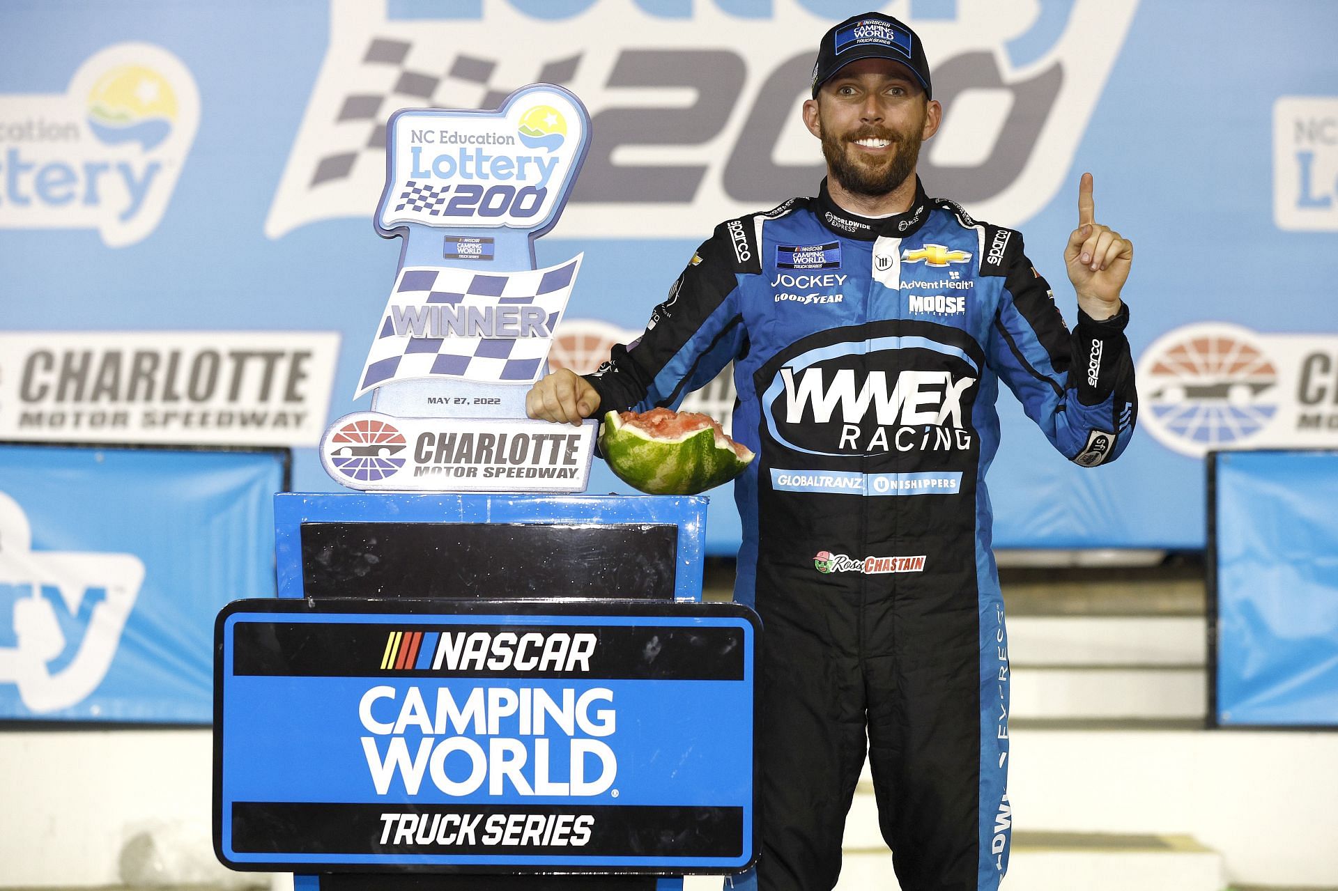 Chastain celebrates in victory lane after winning the NASCAR Camping World Truck Series North Carolina Education Lottery 200 at Charlotte Motor Speedway