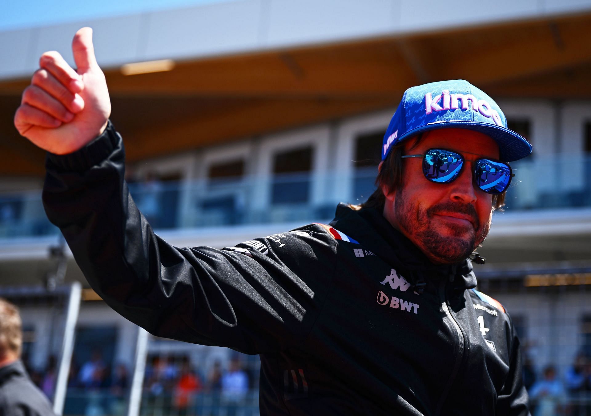 Fernando Alonso waves to the crowd on the drivers&#039; parade ahead of the F1 Grand Prix of Canada at Circuit Gilles Villeneuve on June 19, 2022, in Montreal, Quebec. (Photo by Clive Mason/Getty Images)