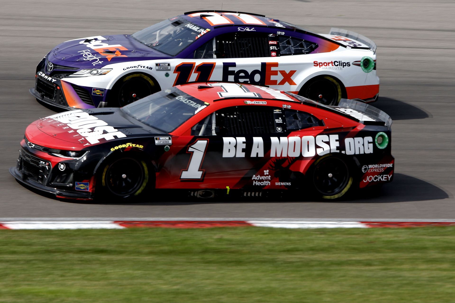 Ross Chastain and Denny Hamlin, driver of the #11 FedEx Freight Toyota, race during the NASCAR Cup Series Enjoy Illinois 300 at WWT Raceway (Photo by Sean Gardner/Getty Images)