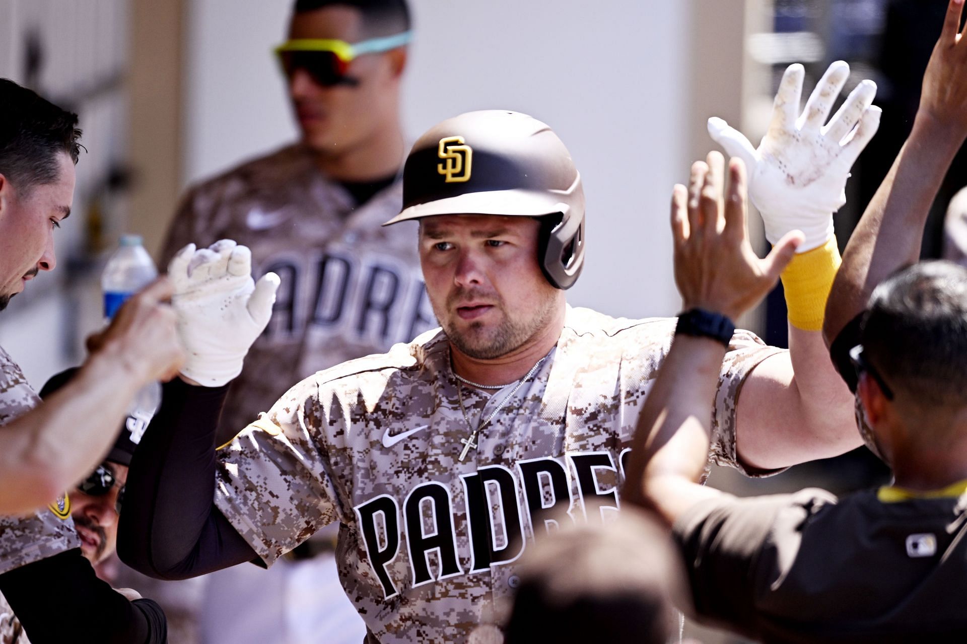 Luke Voit of the San Diego Padres celebrates a home run against the Colorado Rockies.