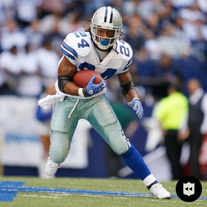 Dallas Cowboys wide receiver Dez Bryant (88) eludes Washington Redskins  defenders to take a Tony Romo pass for 85 yards and a touchdown in the  third quarter at Cowboys Stadium in Arlington