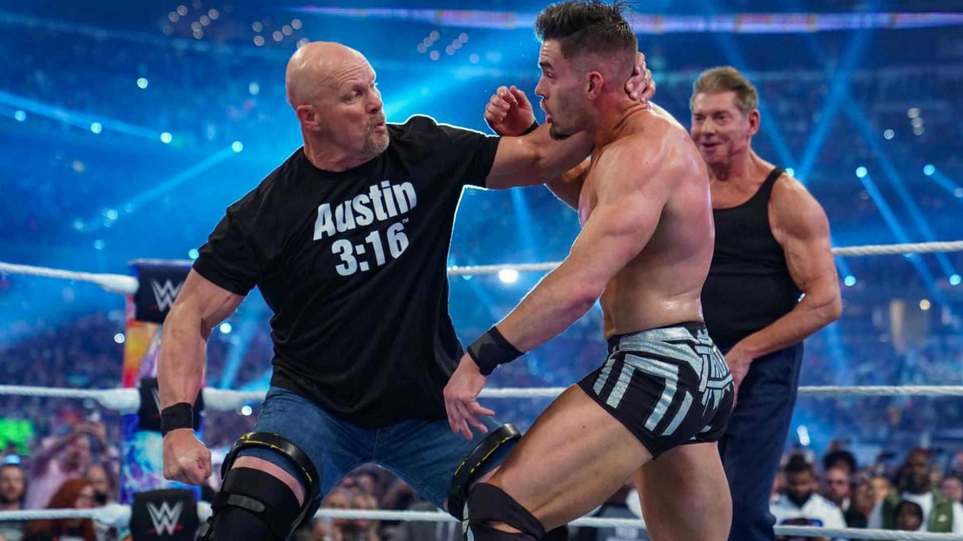 Theory battling with Stone Cold Steve Austin at WrestleMania 38
