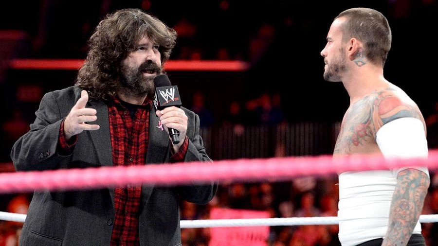 Mick Foley confronts CM Punk