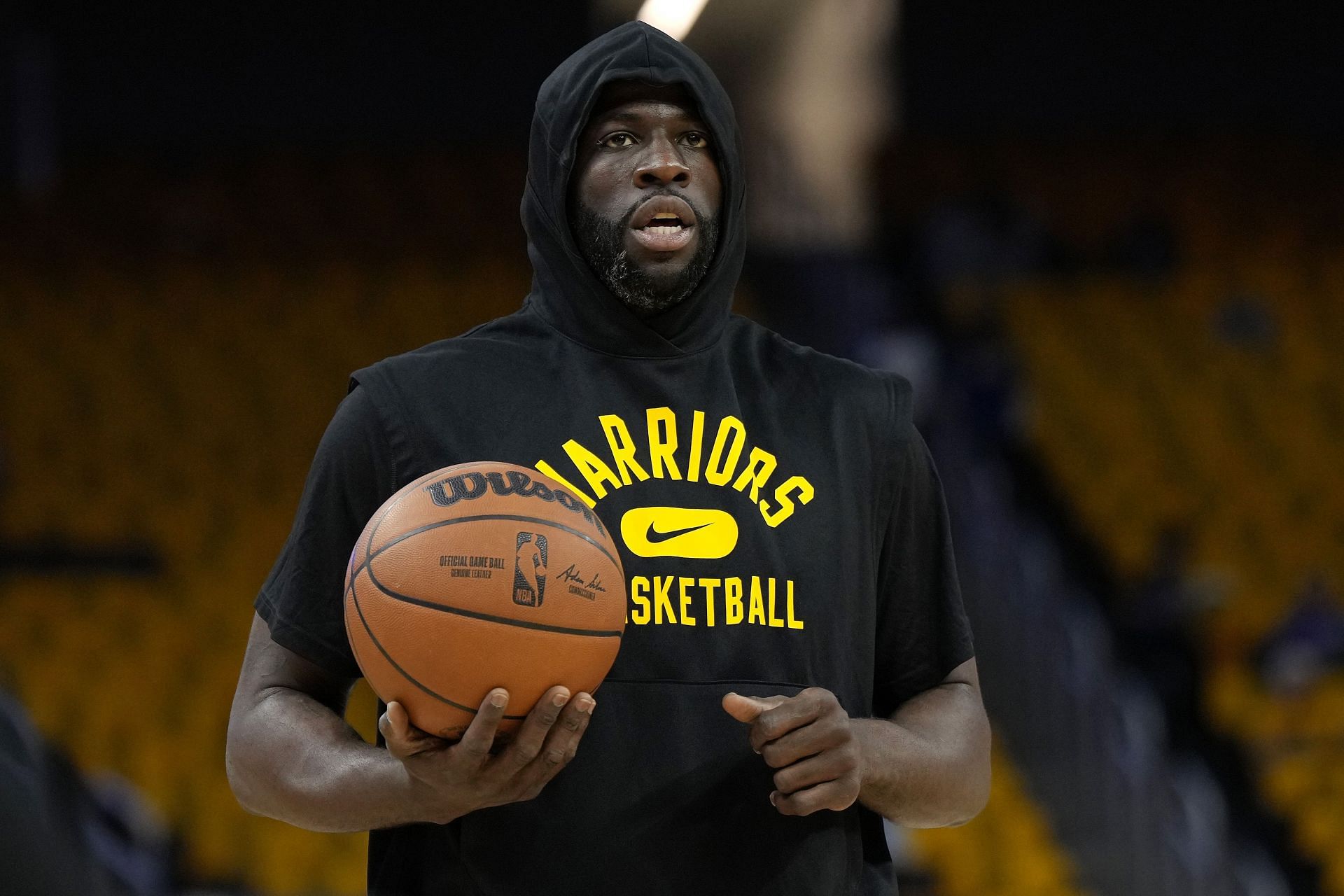 Draymond Green of the Golden State Warriors warms up before Game 1 of the Western Conference finals.