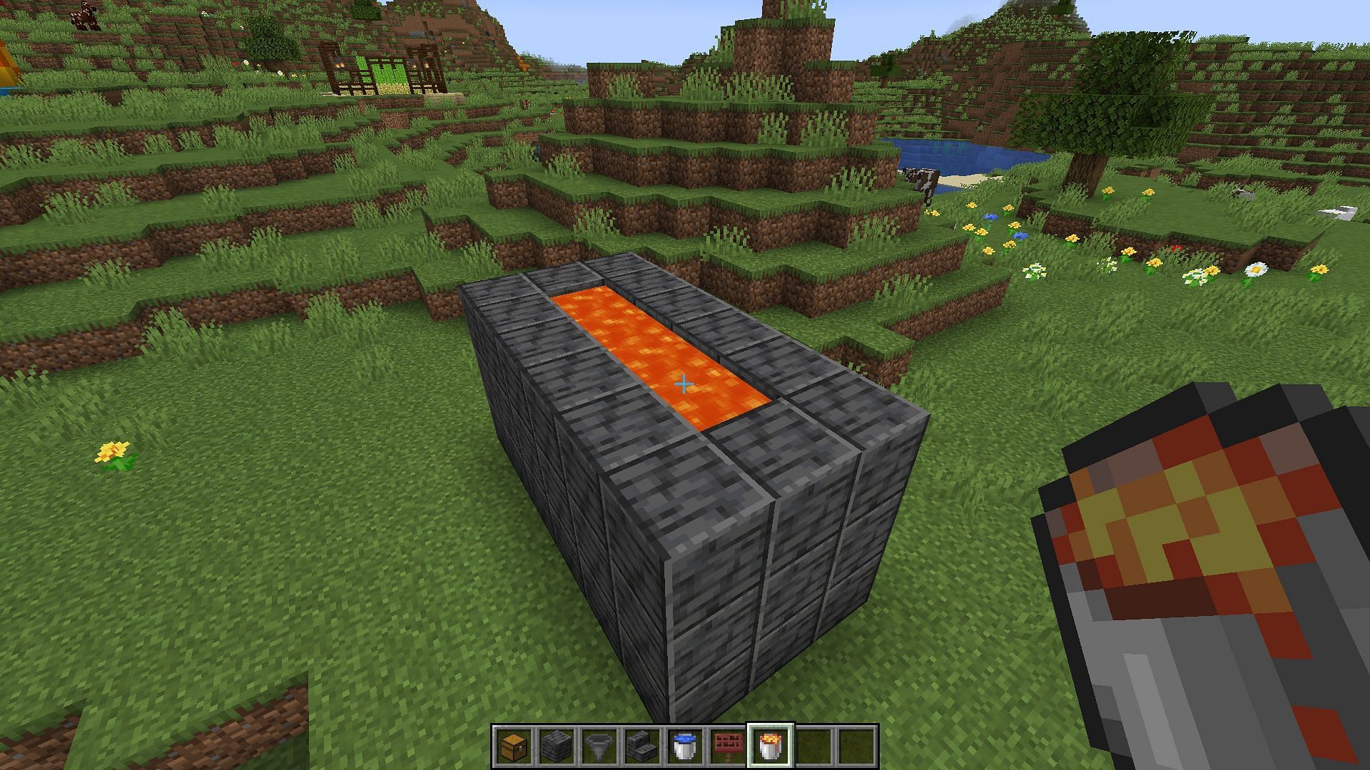 The extra level of foundation is then filled with lava (Image via Minecraft)