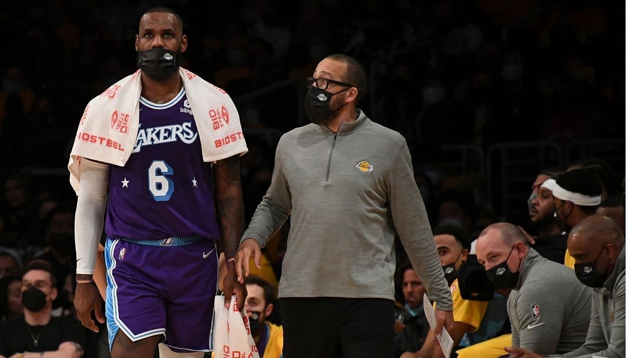 LeBron James with LA Lakers assistant David Fizdale (right) on the sidelines