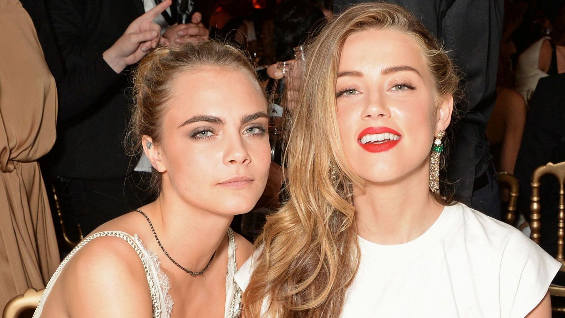 Cara Delevingne and Amber Heard&#039;s relationship explored as elevator photos go viral (Image via Getty Images)