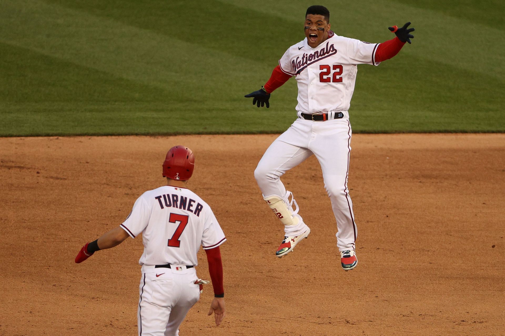 Trea Turner (left) and Juan Soto (right) celebrate during an MLB Atlanta Braves v Washington Nationals game that resulted in a Soto walk-off win.