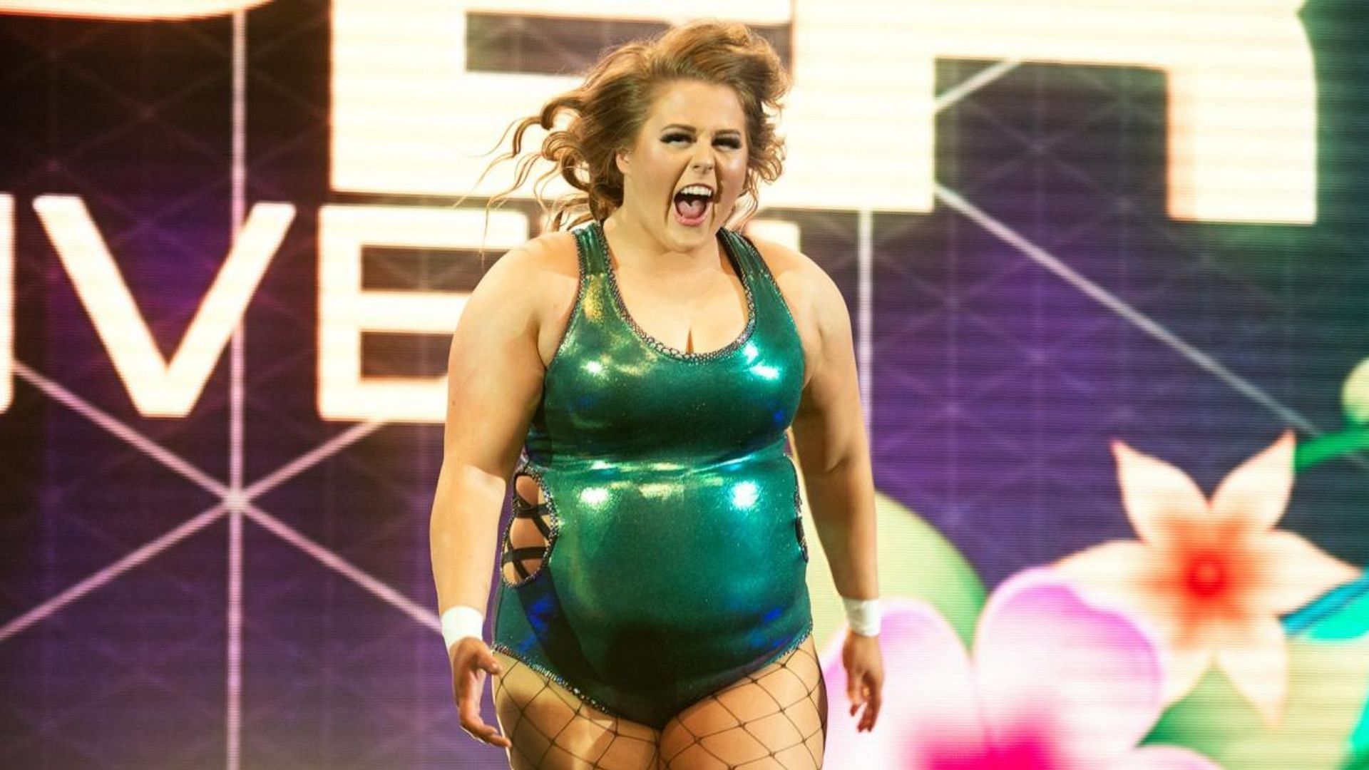 WWE Superstar Doudrop makes her way to the ring