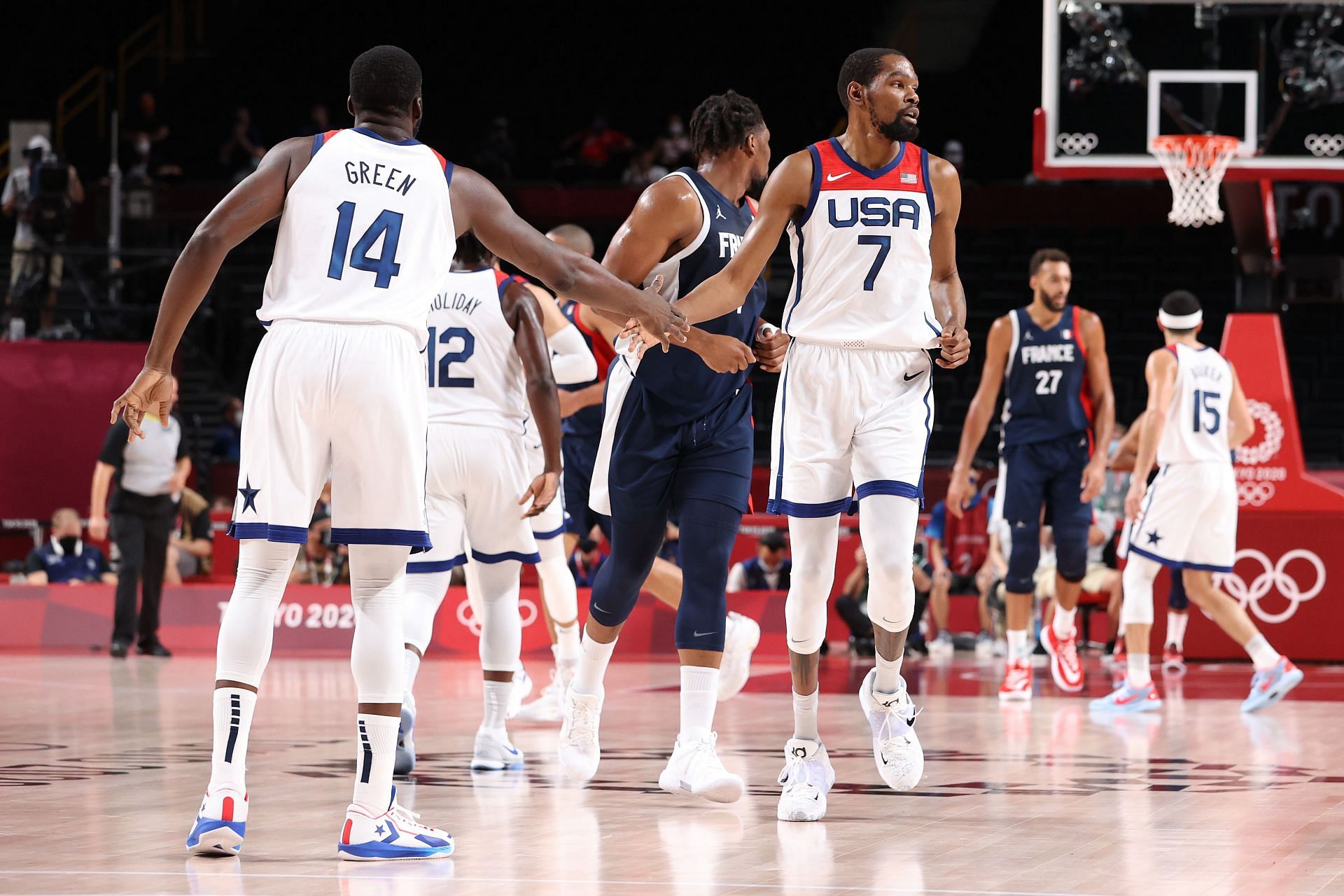 Kevin Durant No. 7 of Team United States congratulated by Draymond Green No. 14 after scoring.