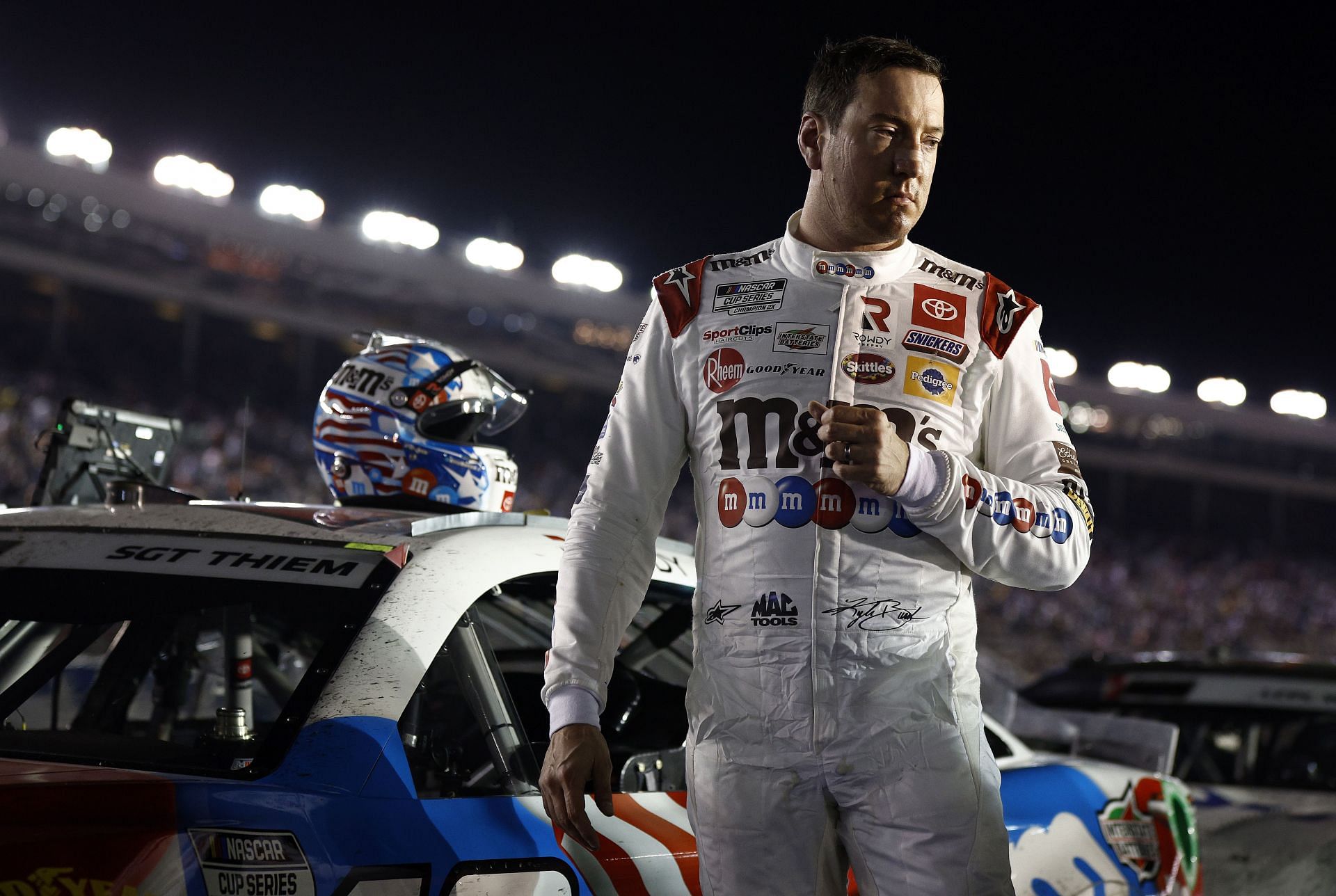 Busch exits his car after the NASCAR Cup Series Coca-Cola 600 at Charlotte Motor Speedway