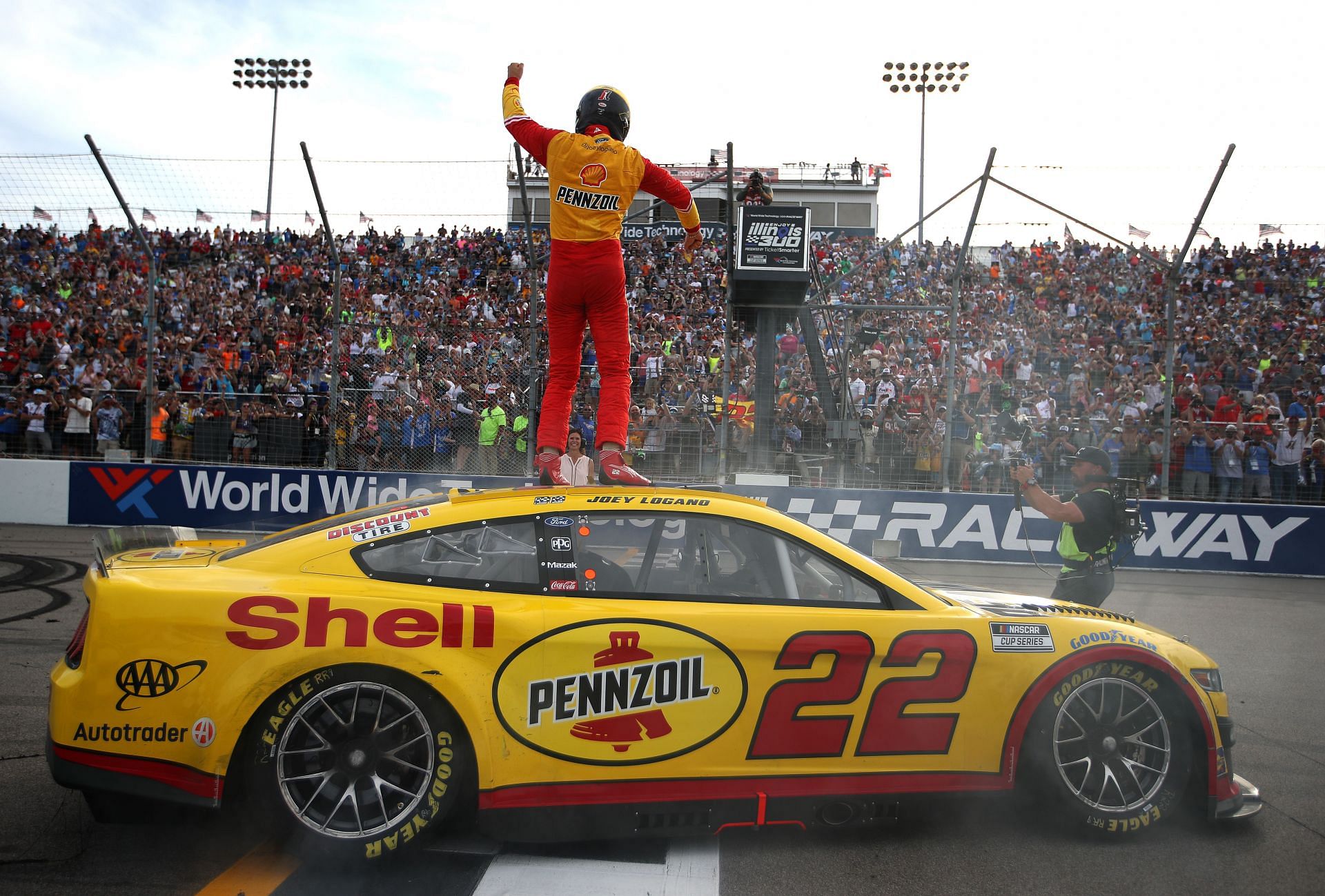 Logano celebrates after winning the NASCAR Cup Series Enjoy Illinois 300 at WWT Raceway