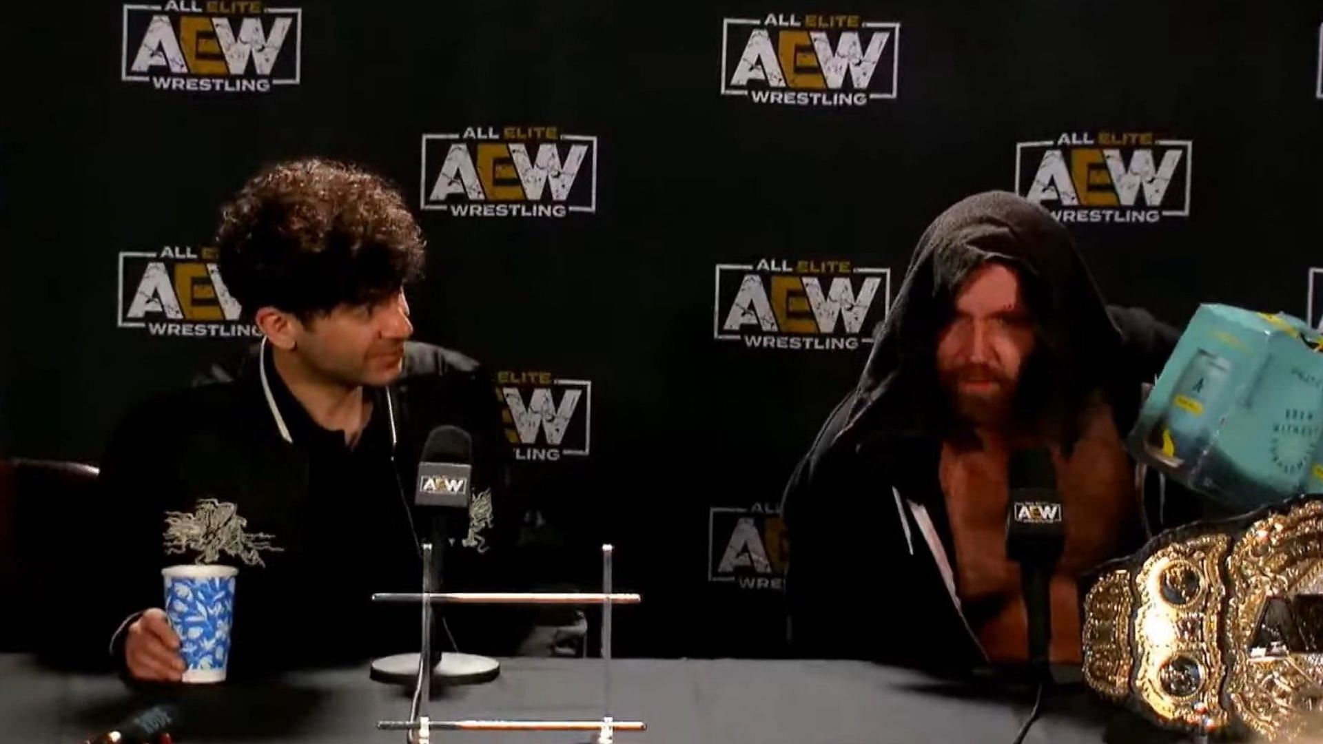 Tony Khan and Jon Moxley at the AEW x NJPW Forbidden Door media scrum