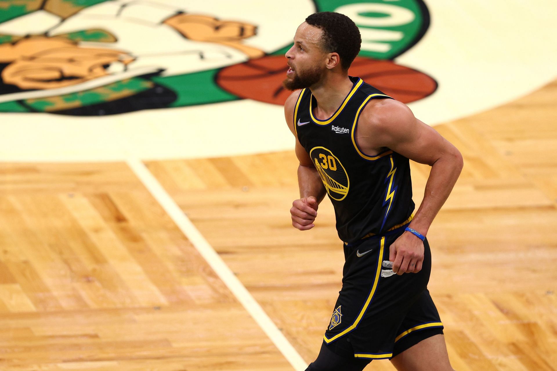 Steph Curry #30 of the Golden State Warriors celebrates a basket in the fourth quarter against the Boston Celtics during Game Four of the 2022 NBA Finals at TD Garden on June 10, 2022 in Boston, Massachusetts.