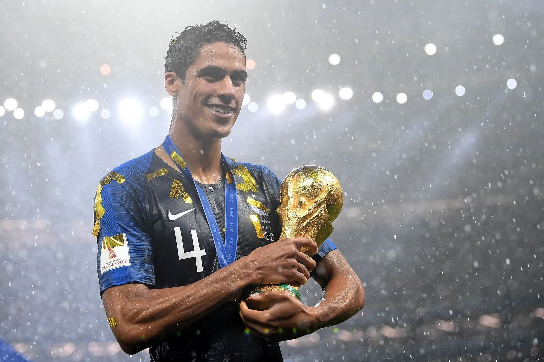 Varane posing with the World Cup
