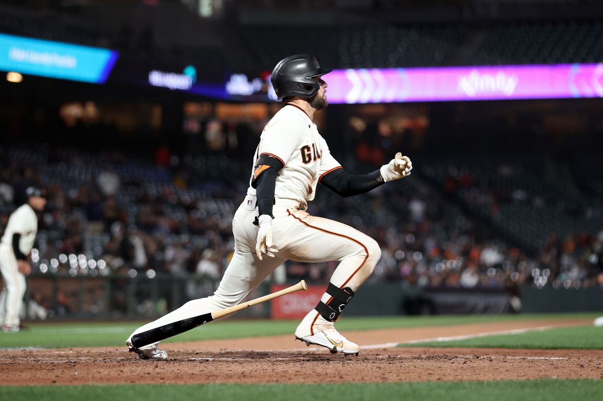 Luis Gonzalez of the San Francisco Giants hits a single that resulted in the winning run.