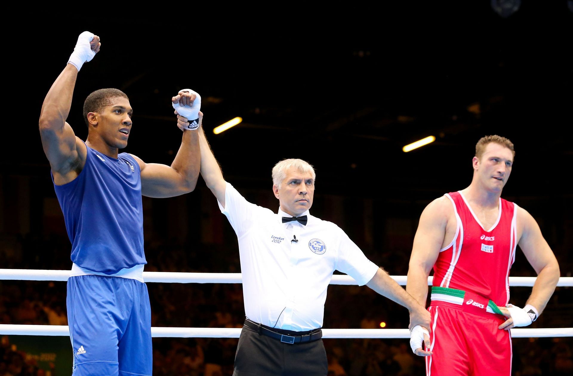 Anthony Joshua getting his hand raised as Olympic champion.