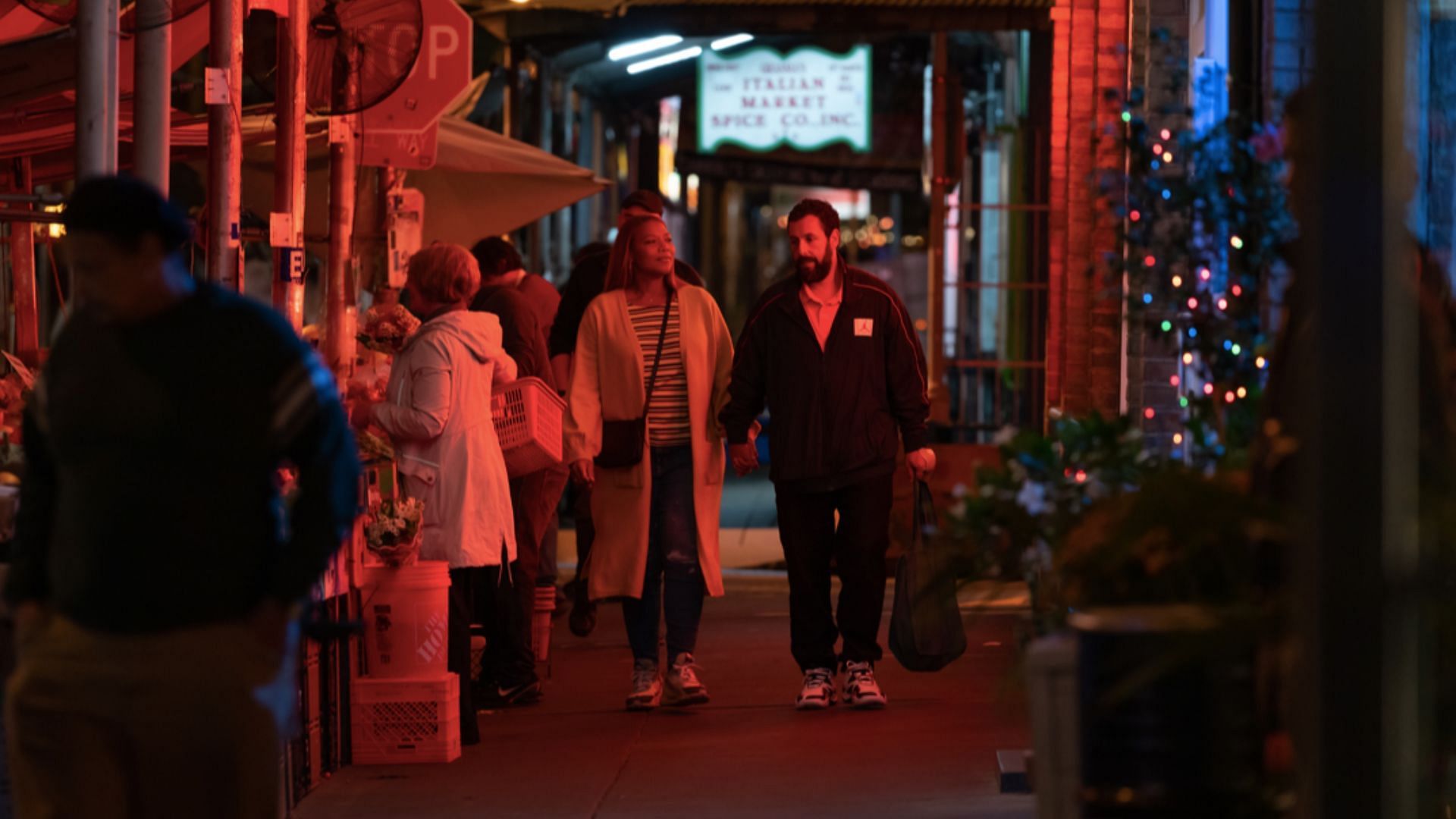 Queen Latifah and Adam Sandler in Hustle (Image via IMDb)