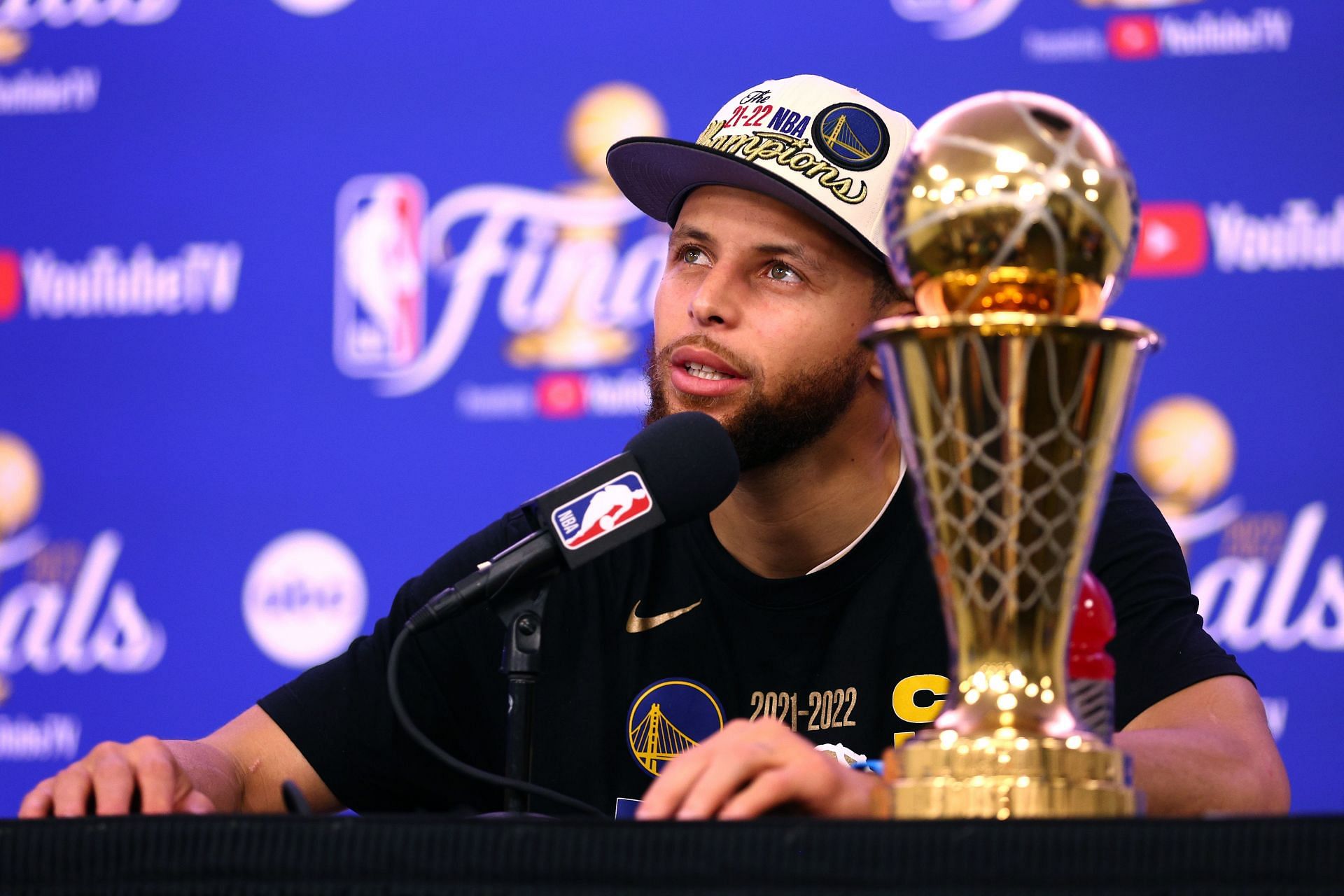 Steph Curry with the Finals MVP at the posttgame presser