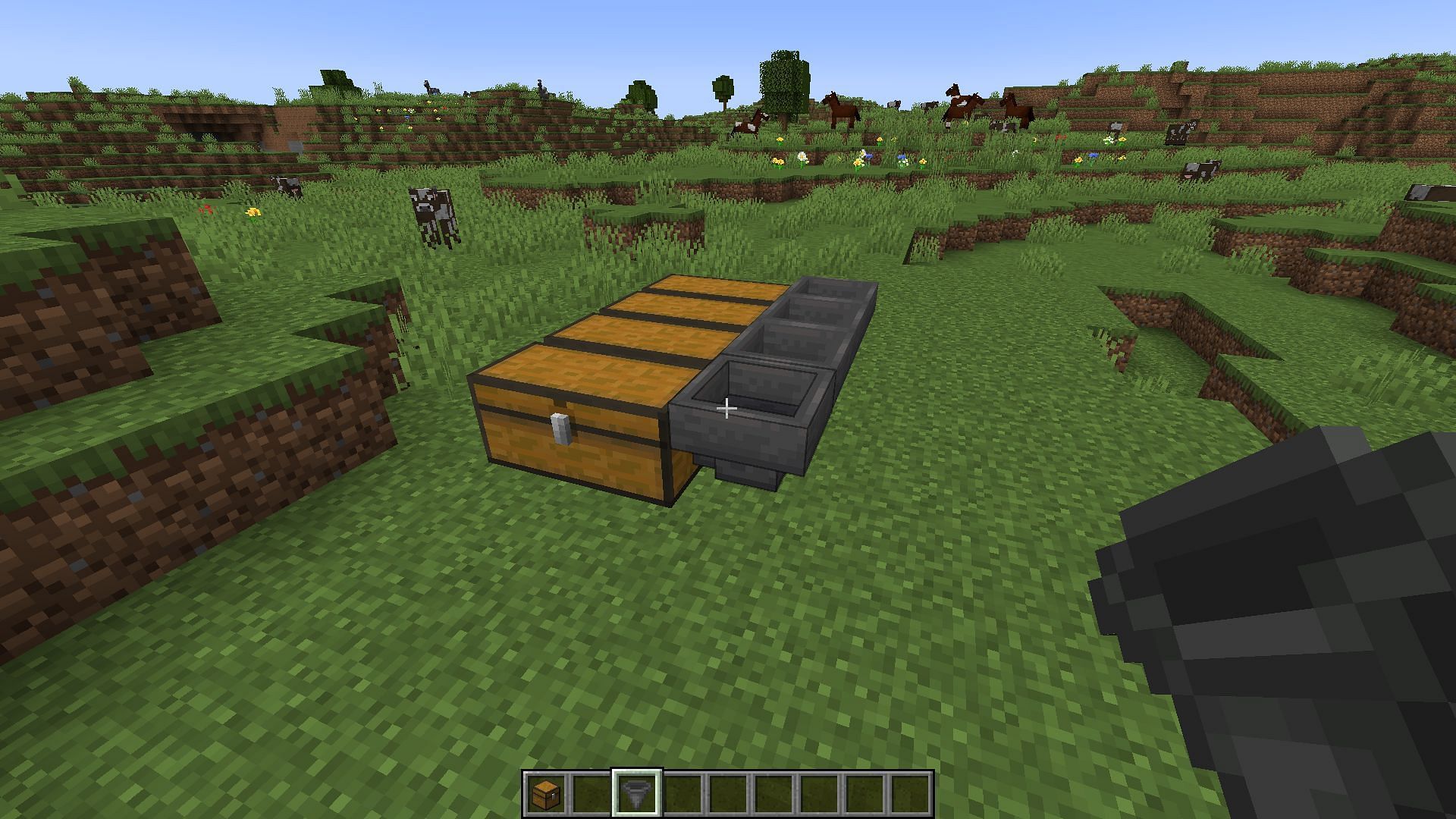 The cobblestone generator&#039;s collection system (Image via Minecraft)