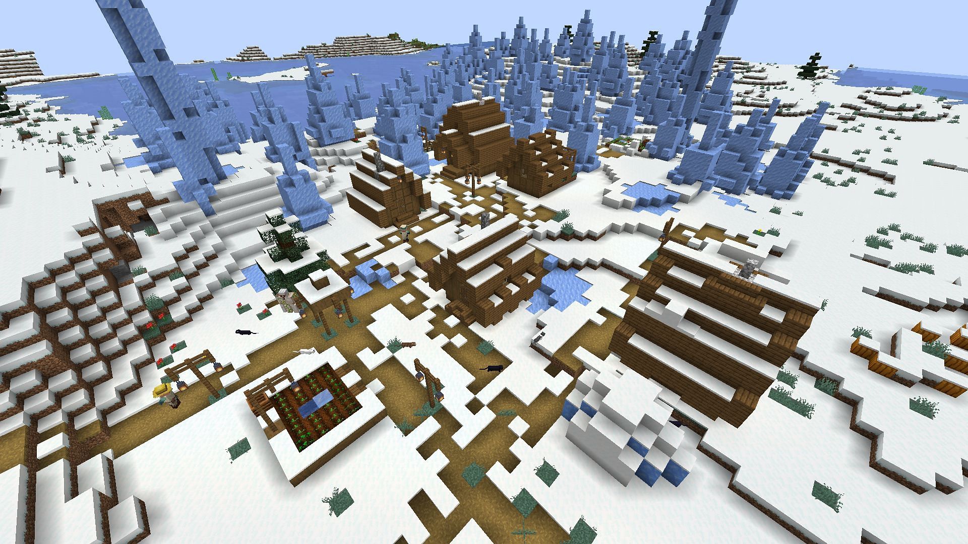 The ice spike biome and village near spawn (Image via Minecraft)