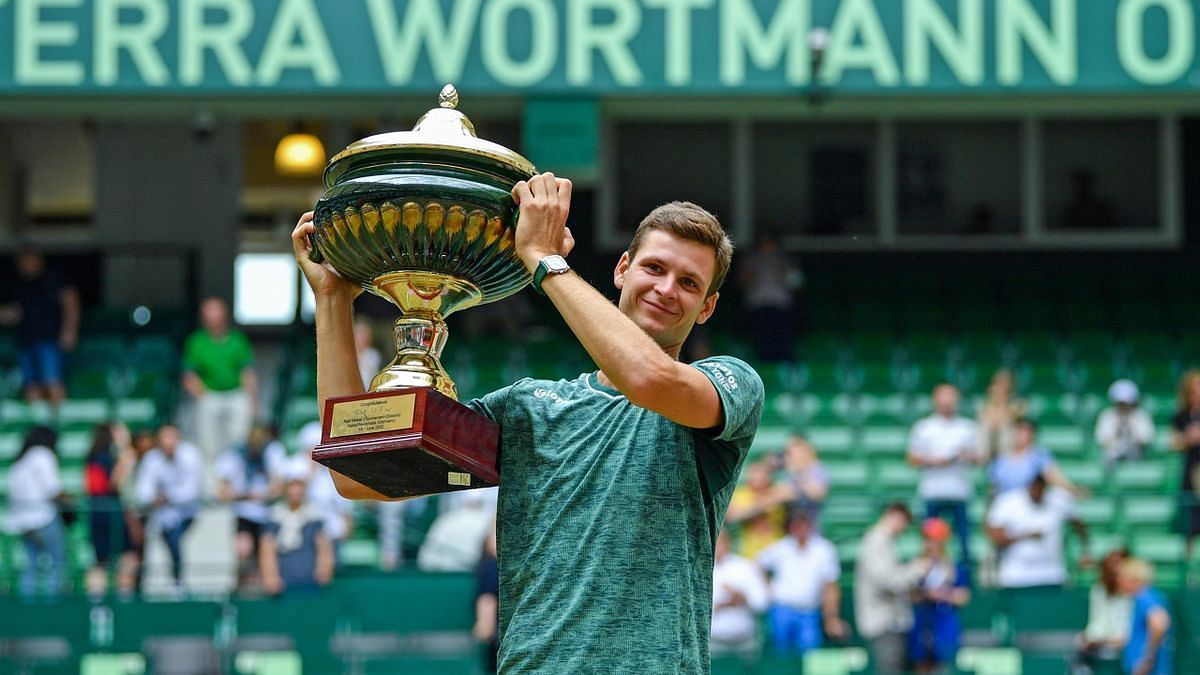 Hubert Hurkacz with the Halle Open trophy