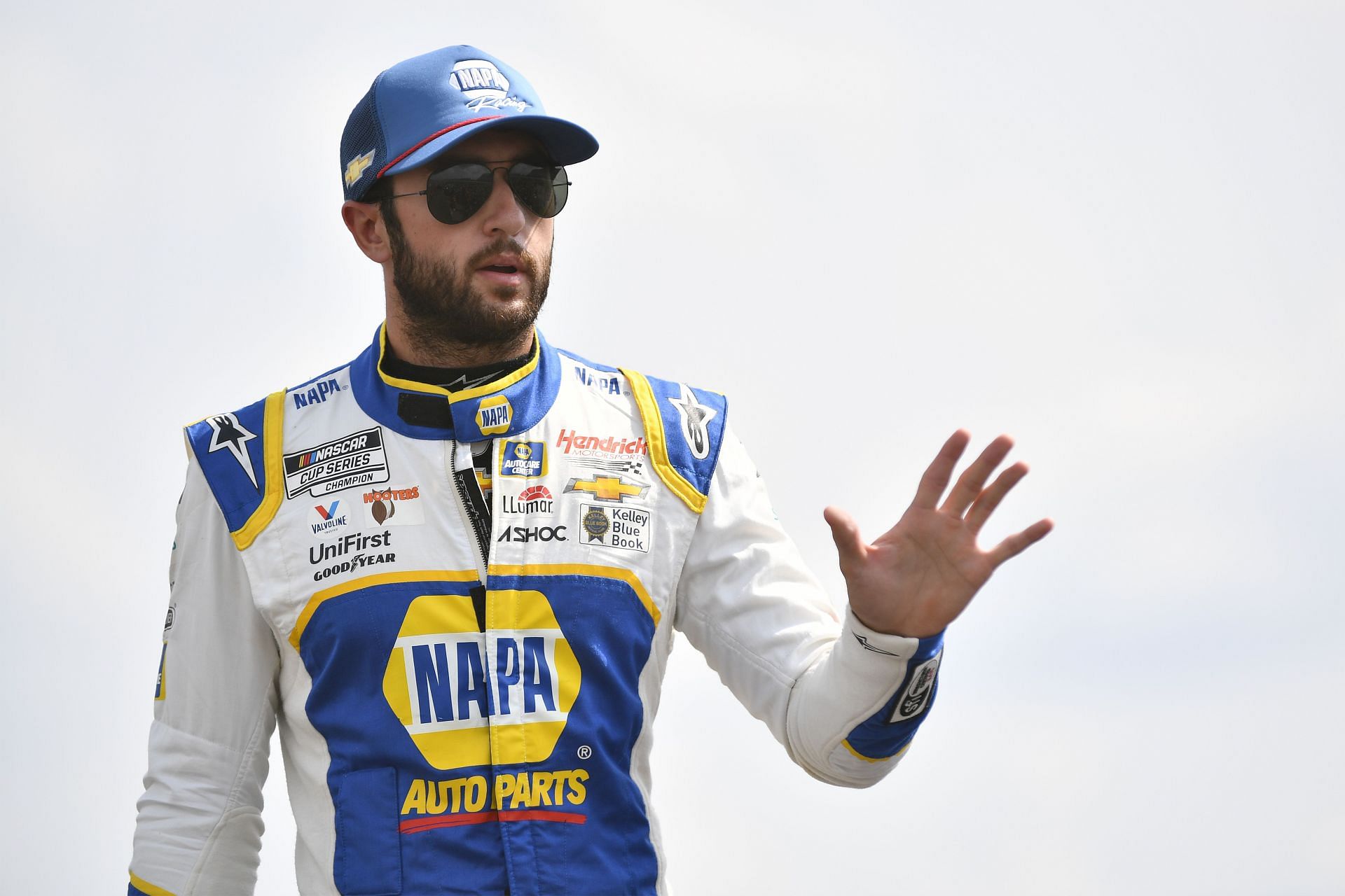 : Chase Elliott waves to fans onstage during driver intros prior to the NASCAR Cup Series Ally 400 at Nashville Superspeedway