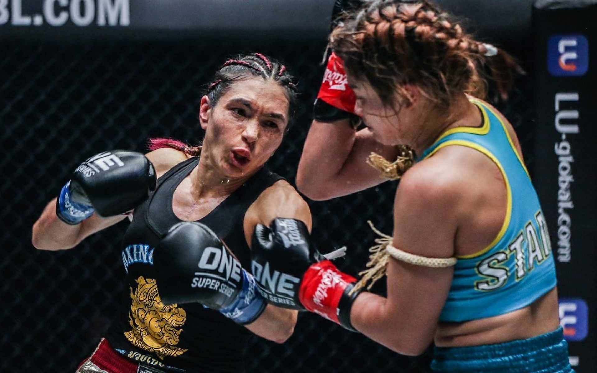 Janet Todd (left) and Stamp Fairtext (right) in their second fight in ONE Championship. [Photo ONE Championship]
