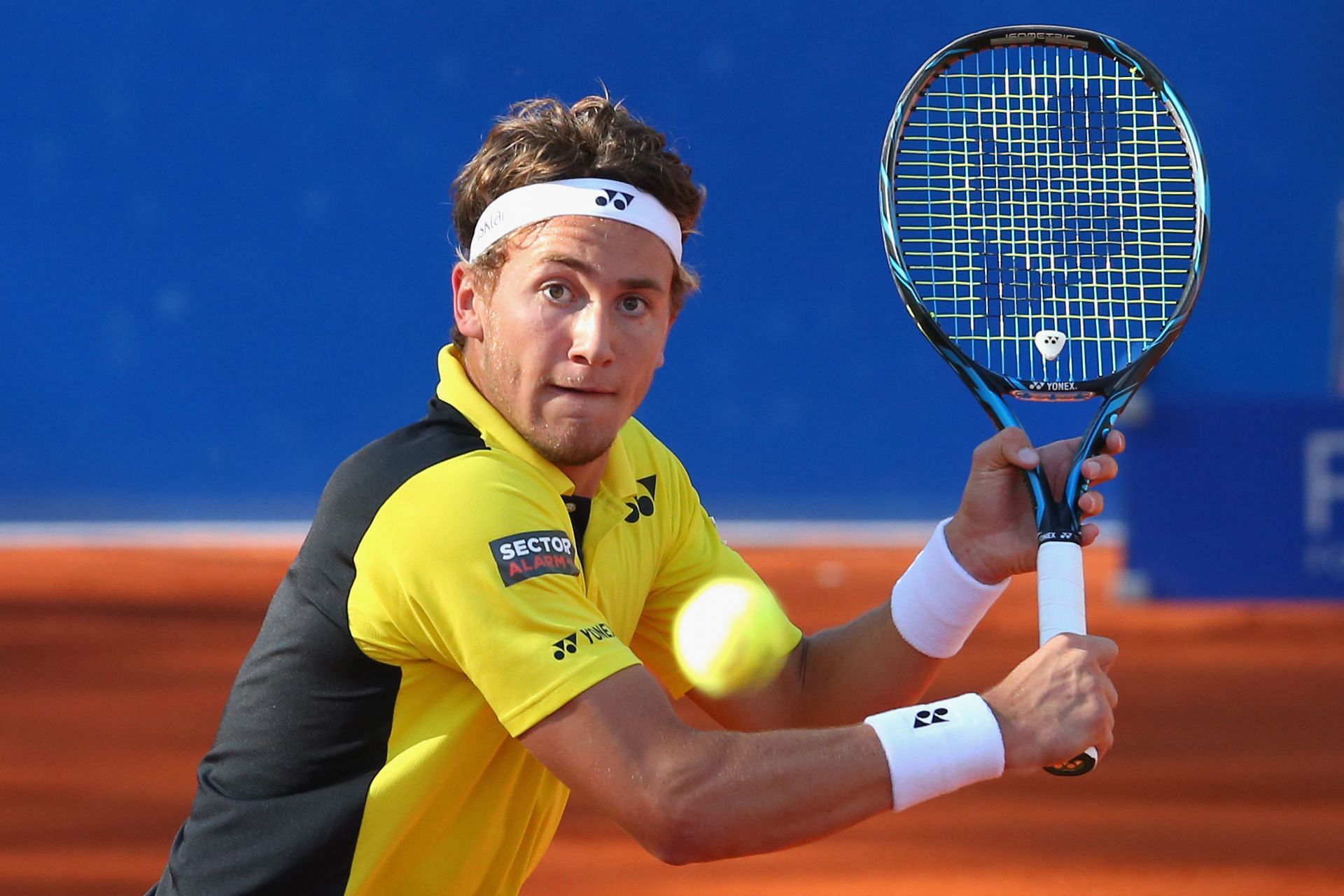 Casper Ruud attempts a volley in his early days as a young professional