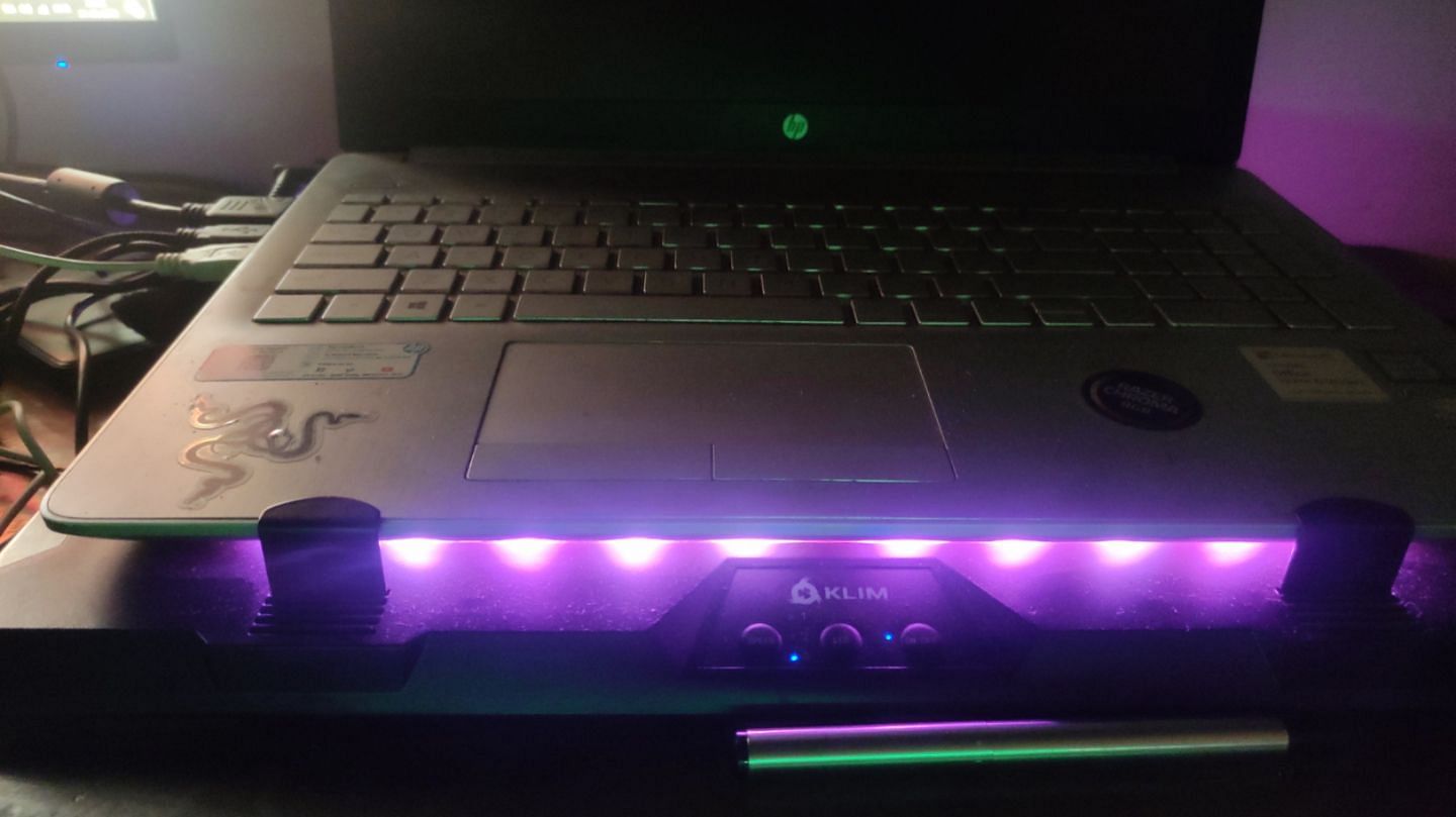 The cooling pad was extremely easy to install and looks gorgeous in the dark (Image via Sportskeeda)