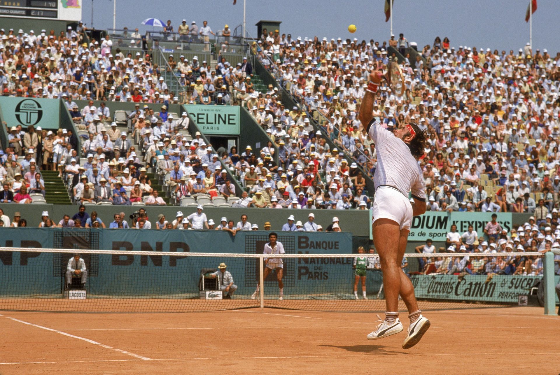 Guillermo Vilas serves at the 1977 French Open