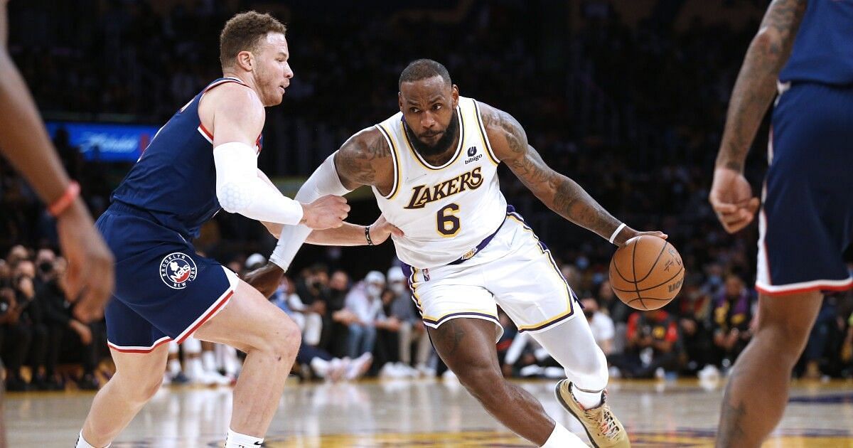 Blake Griffin of the Brooklyn Nets guarding LeBron James of the LA Lakers [Source: LA Times]