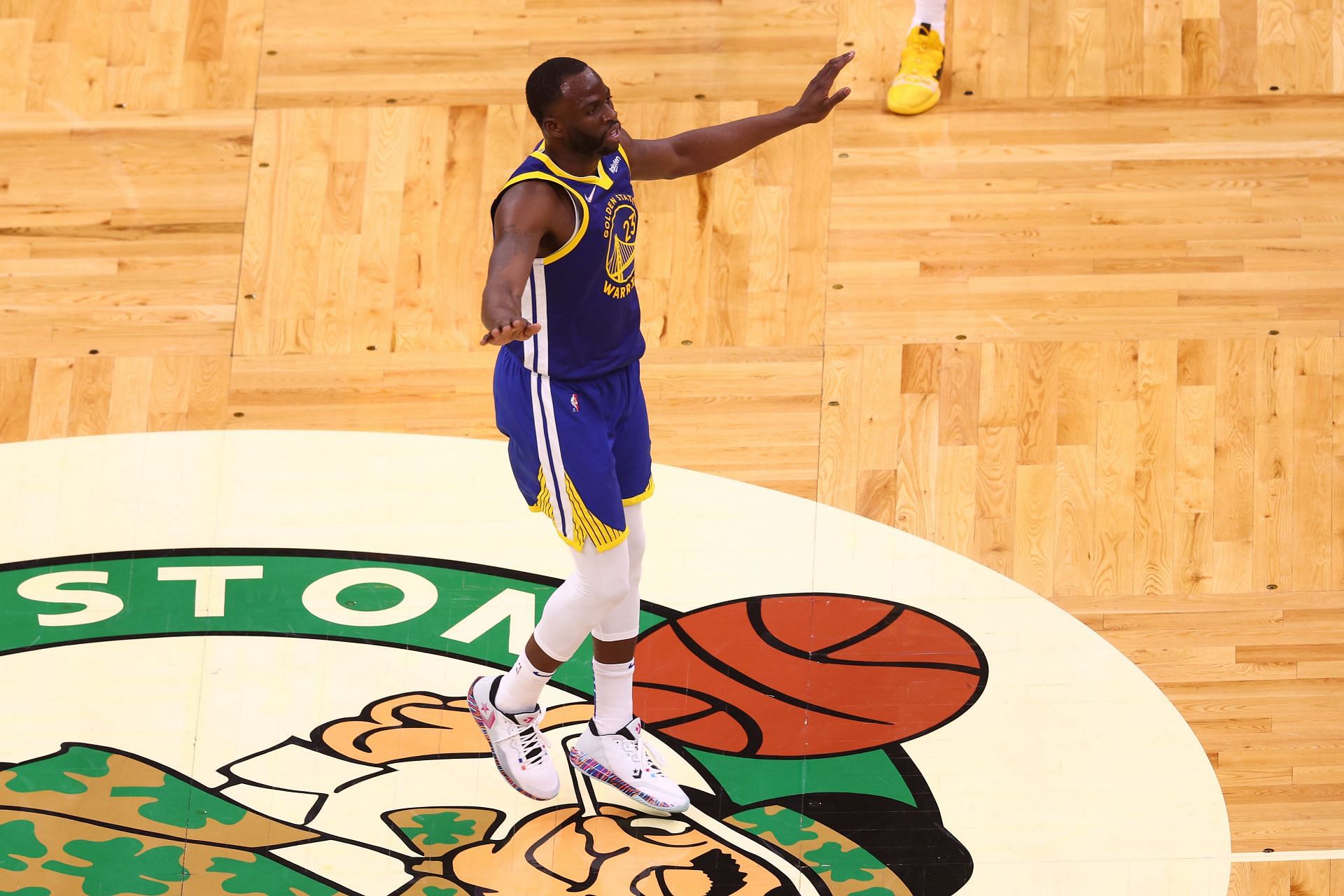 Draymond Green of the Golden State Warriors signals the crowd to quiet down after hitting a 3-pointer in Game 6 of the 2022 NBA Finals.