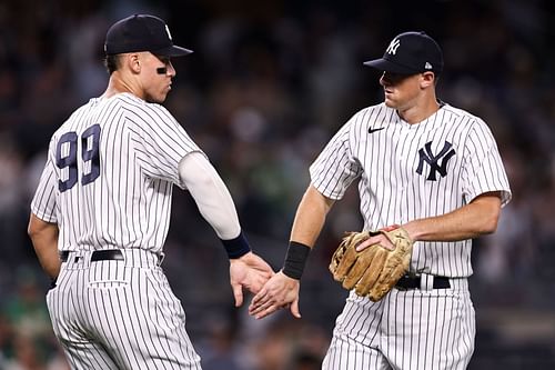 Players celebrate during an Oakland Athletics v New York Yankees game.