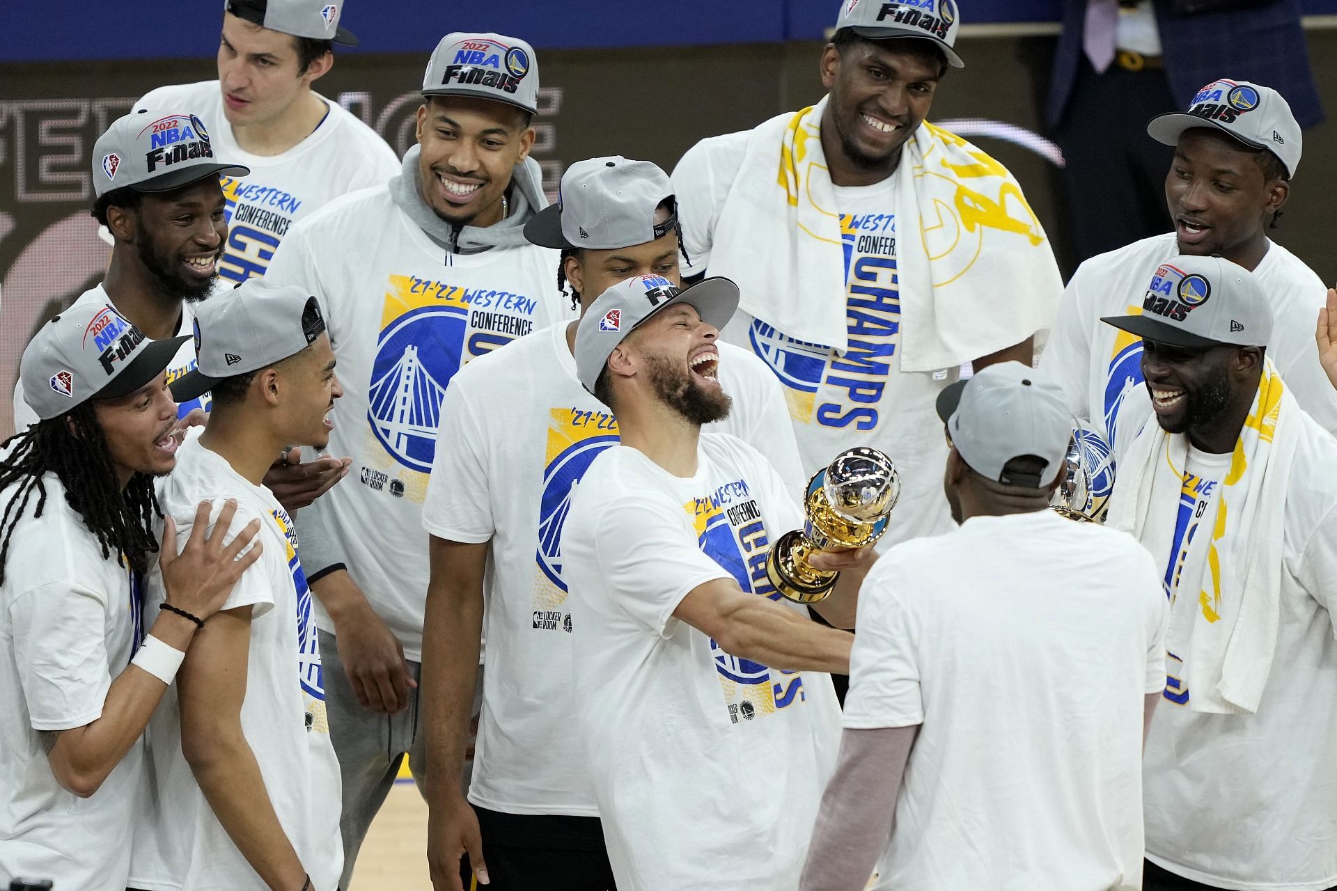 Stephen Curry of the Golden State Warriors celebrates winning the Magic Johnson WCFMVP award