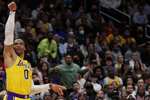 Russell Westbrook holds his action after the shot