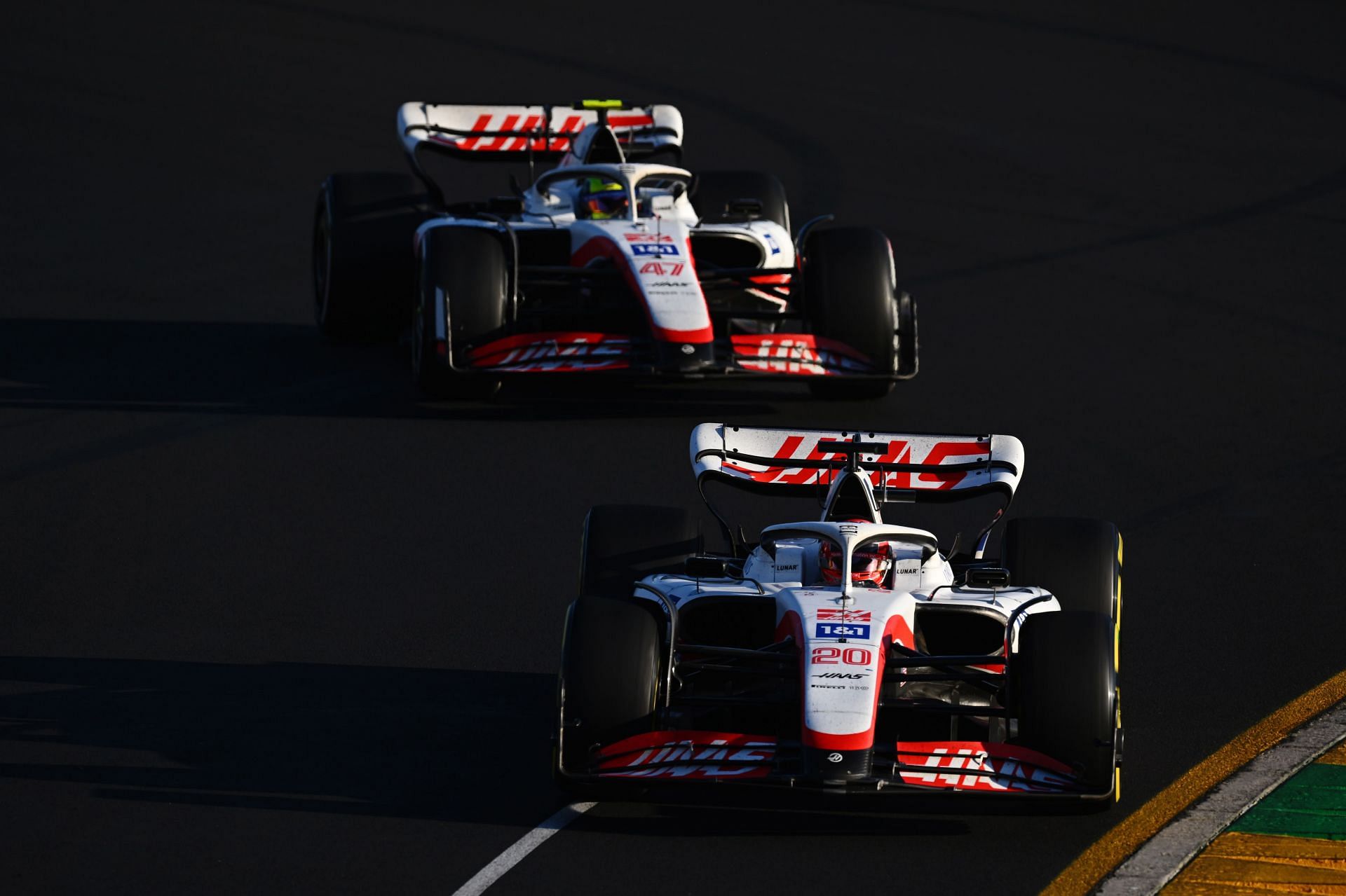Haas F1&#039;s Kevin Magnussen (foreground) leading his teammate Mick Schumacher during the 2022 F1 Australian GP (Photo by Clive Mason/Getty Images)