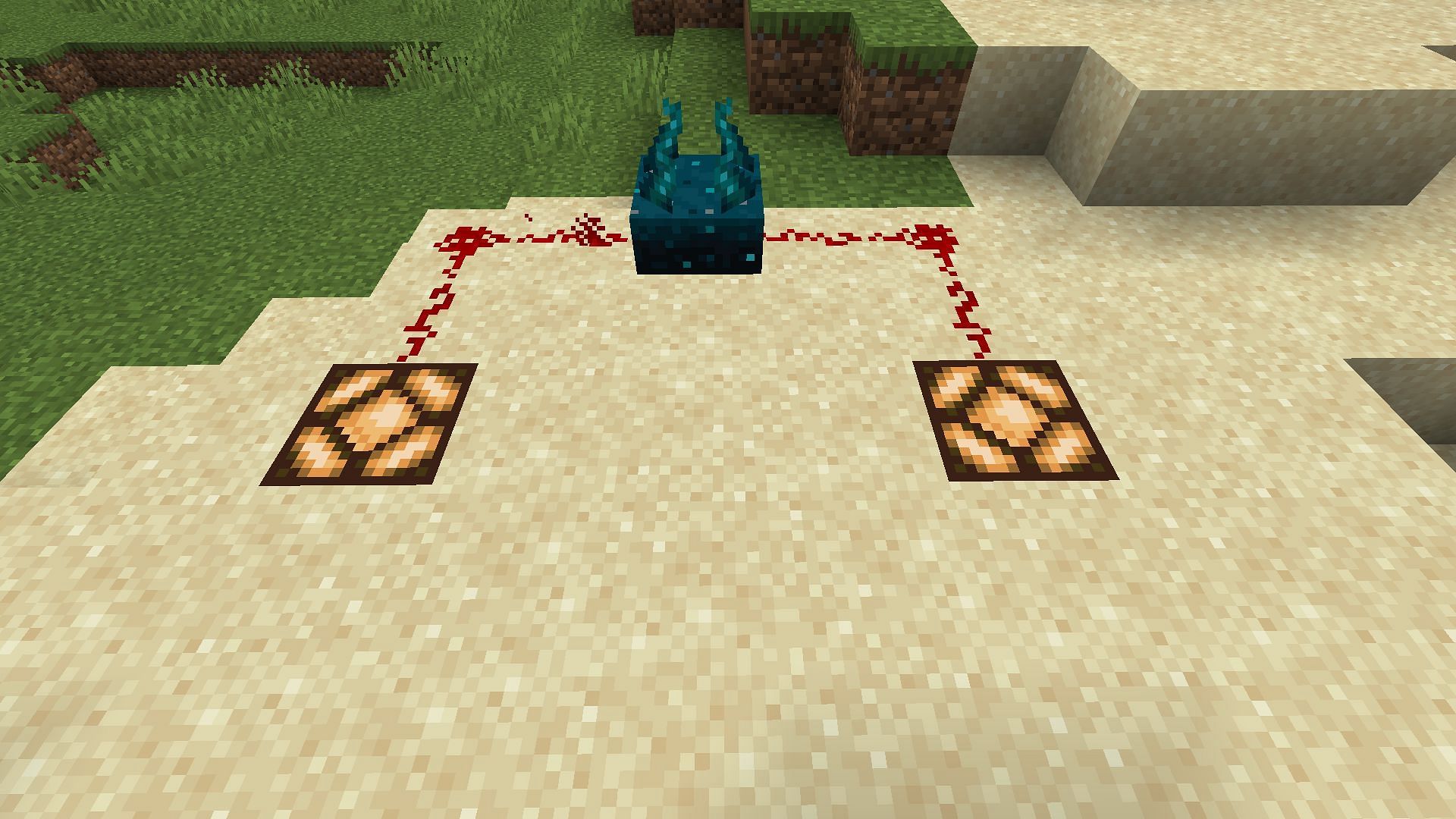 A sculk sensor activating two redstone lamps (Image via Minecraft)