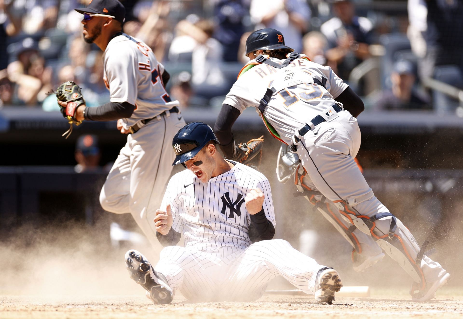 Anthony Rizzo slides safely into home.