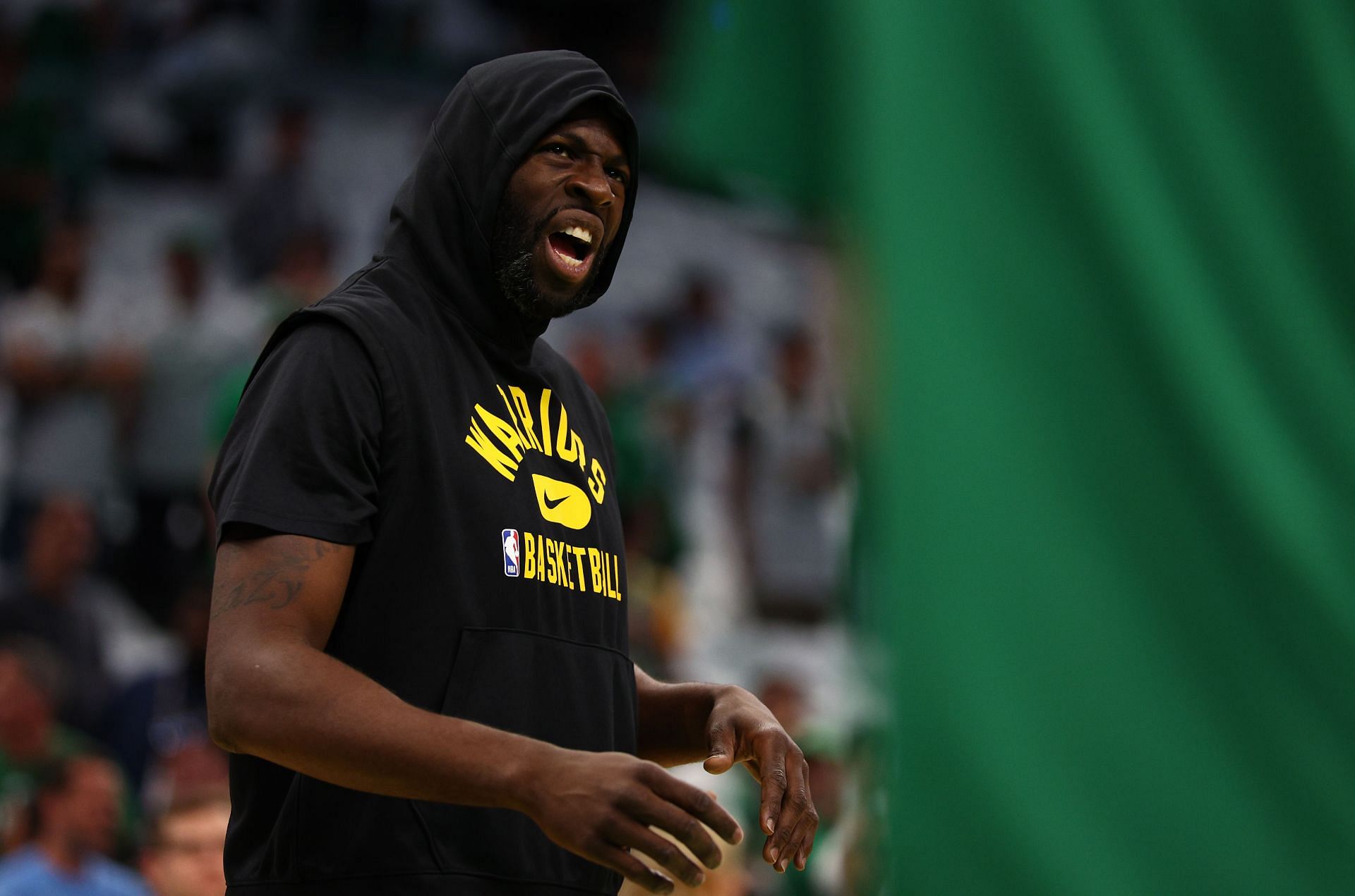 Draymond Green warms up before Game 4.
