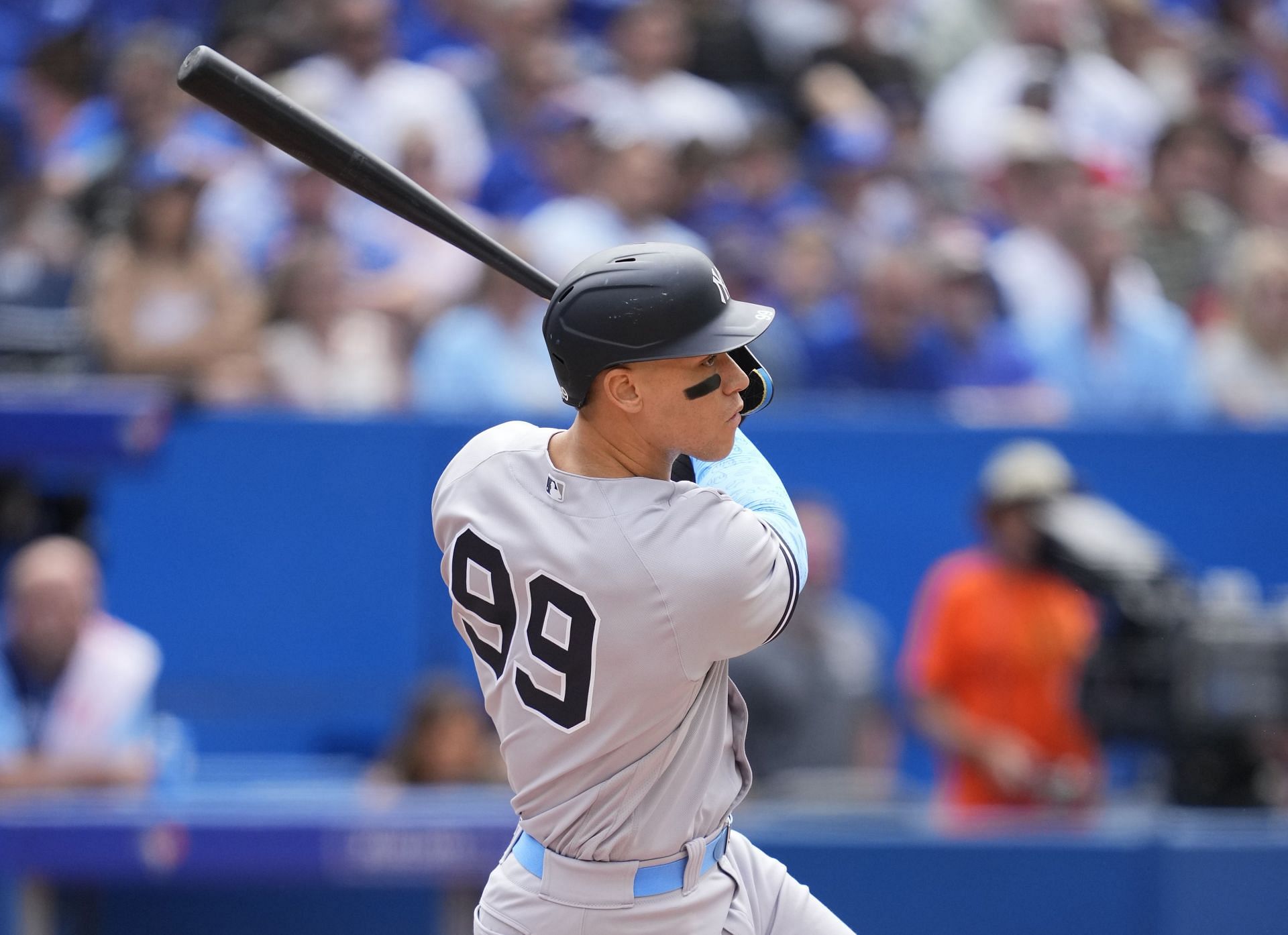 Aaron Judge hits an RBI double during New York Yankees v Toronto Blue Jays game.