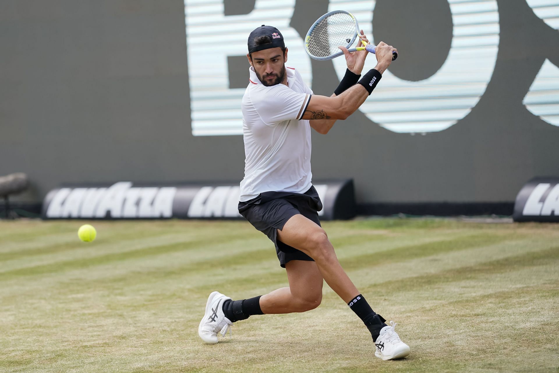 Matteo Berrettini in acion at the 2022 Boss Open in Stuttgart