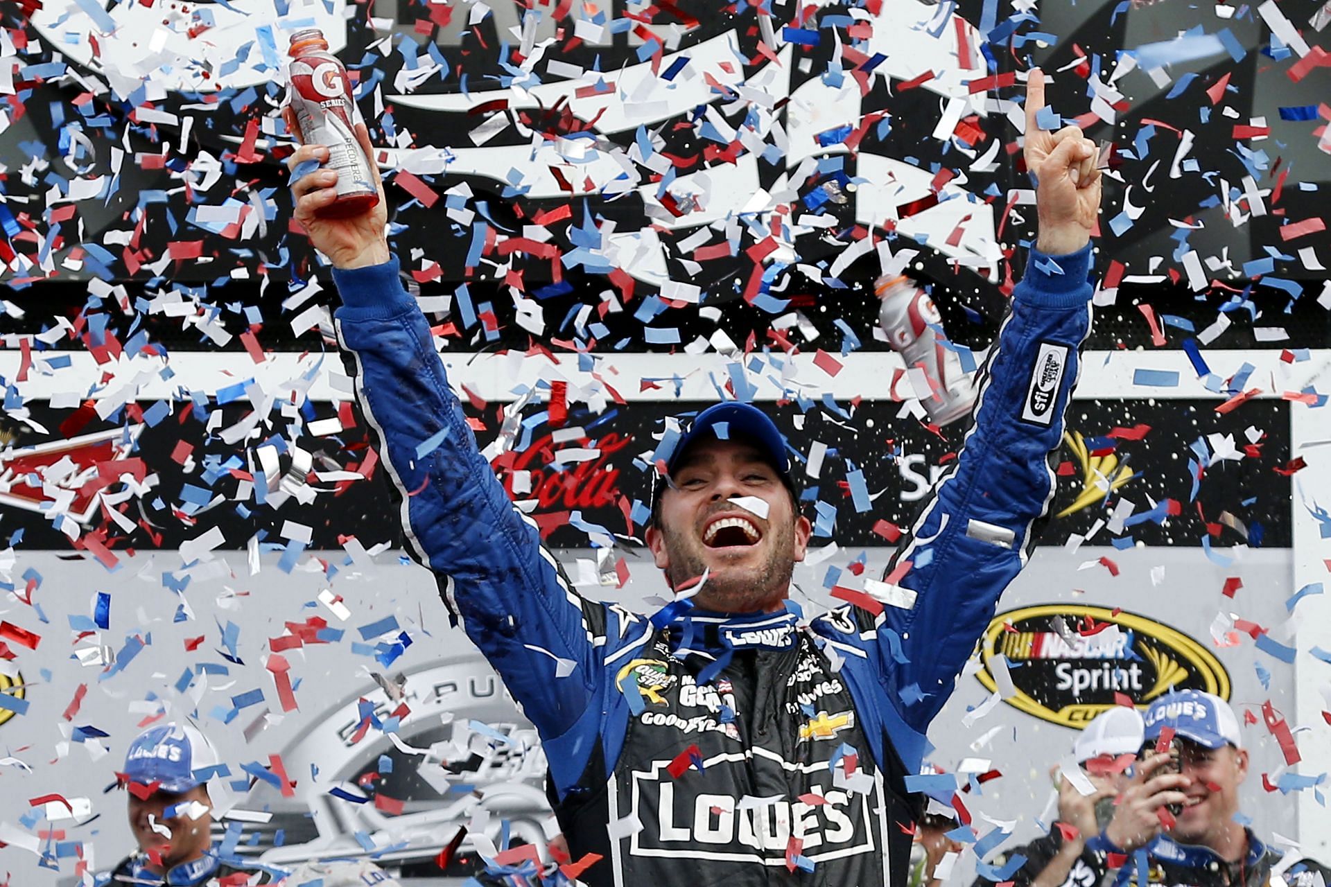 Jimmie Johnson celebrates in victory lane after winning the 2013 NASCAR Sprint Cup Series Daytona 500 at Daytona International Speedway in Daytona Beach, Florida. (Photo by Chris Graythen/Getty Images)