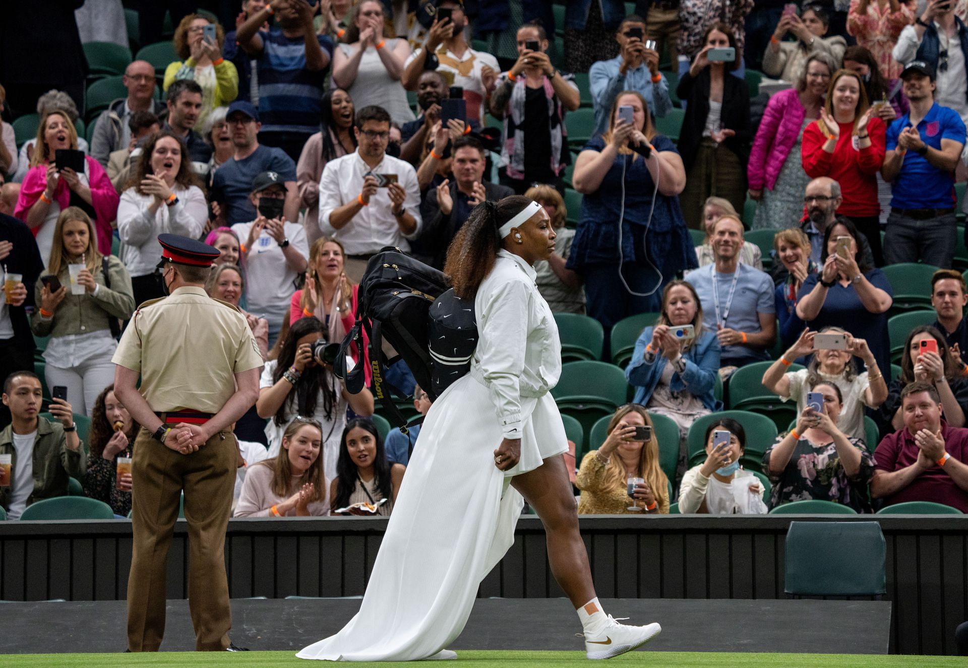 Williams arrives at the Center Court of Wimbledon for her first-round match last year