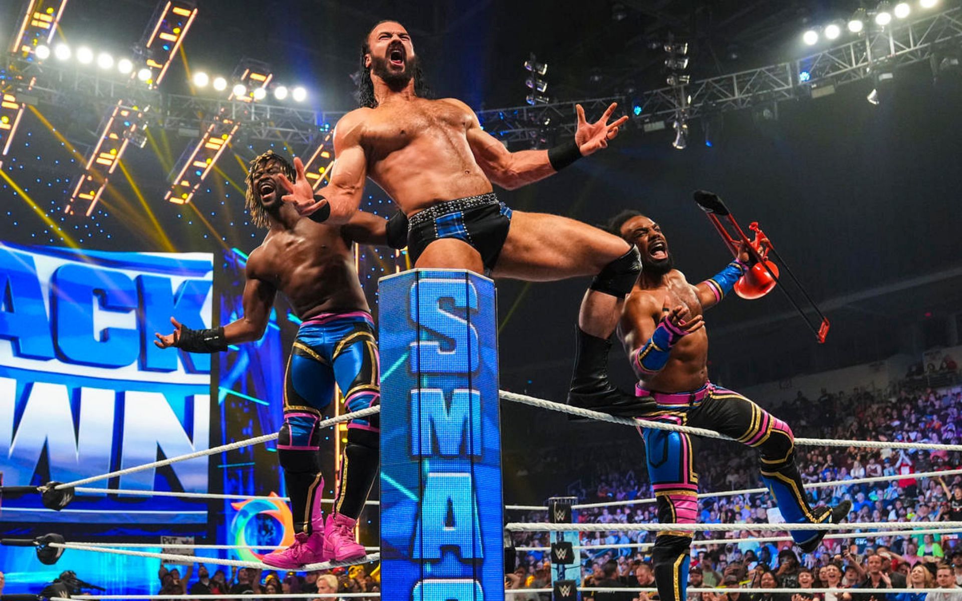 Drew McIntyre and The New Day celebrating their win last week on the blue brand