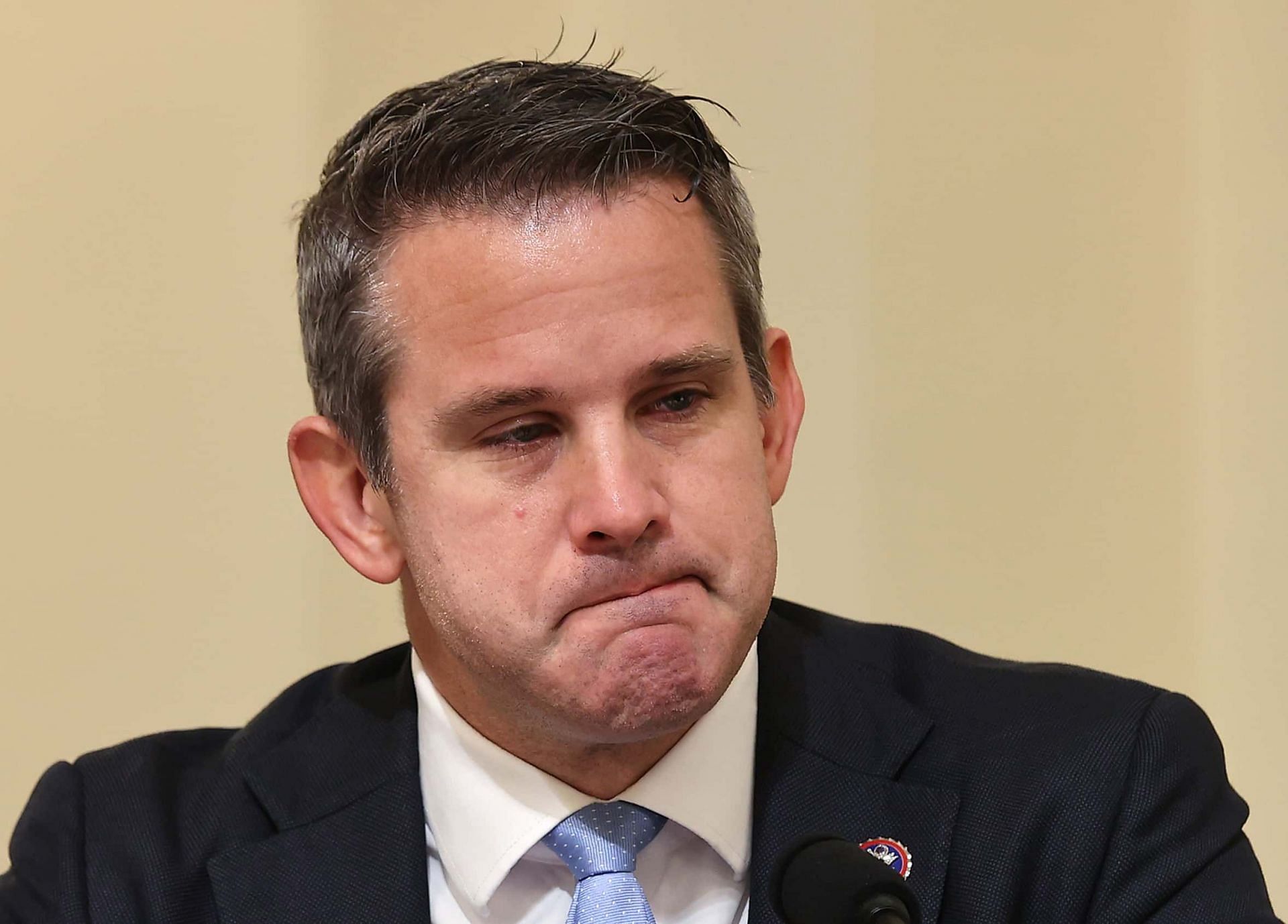 Adam Kinzinger at a hearing investigating the Januray 6 riots (Image via Chip Somodevilla/Getty Images)